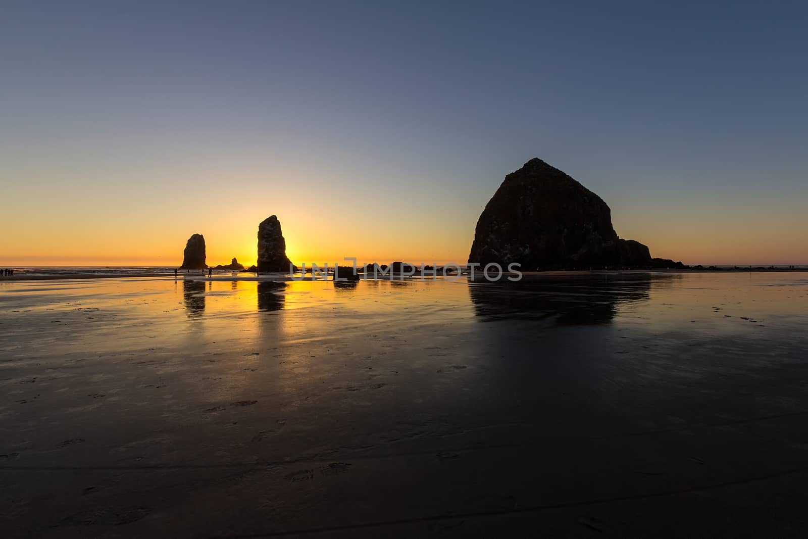 Haystcak Rock and the Needles at Cannon Beach Oregon Coast low tide during sunset