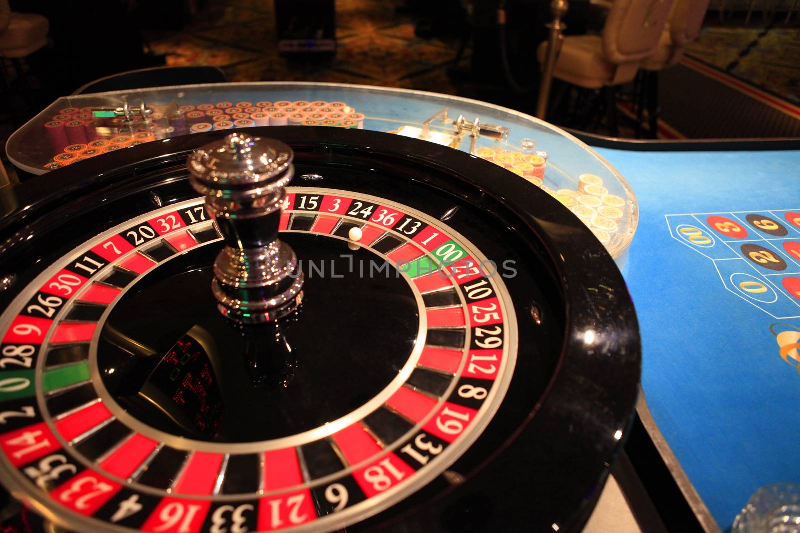 Roulette table and gambling chips  by friday