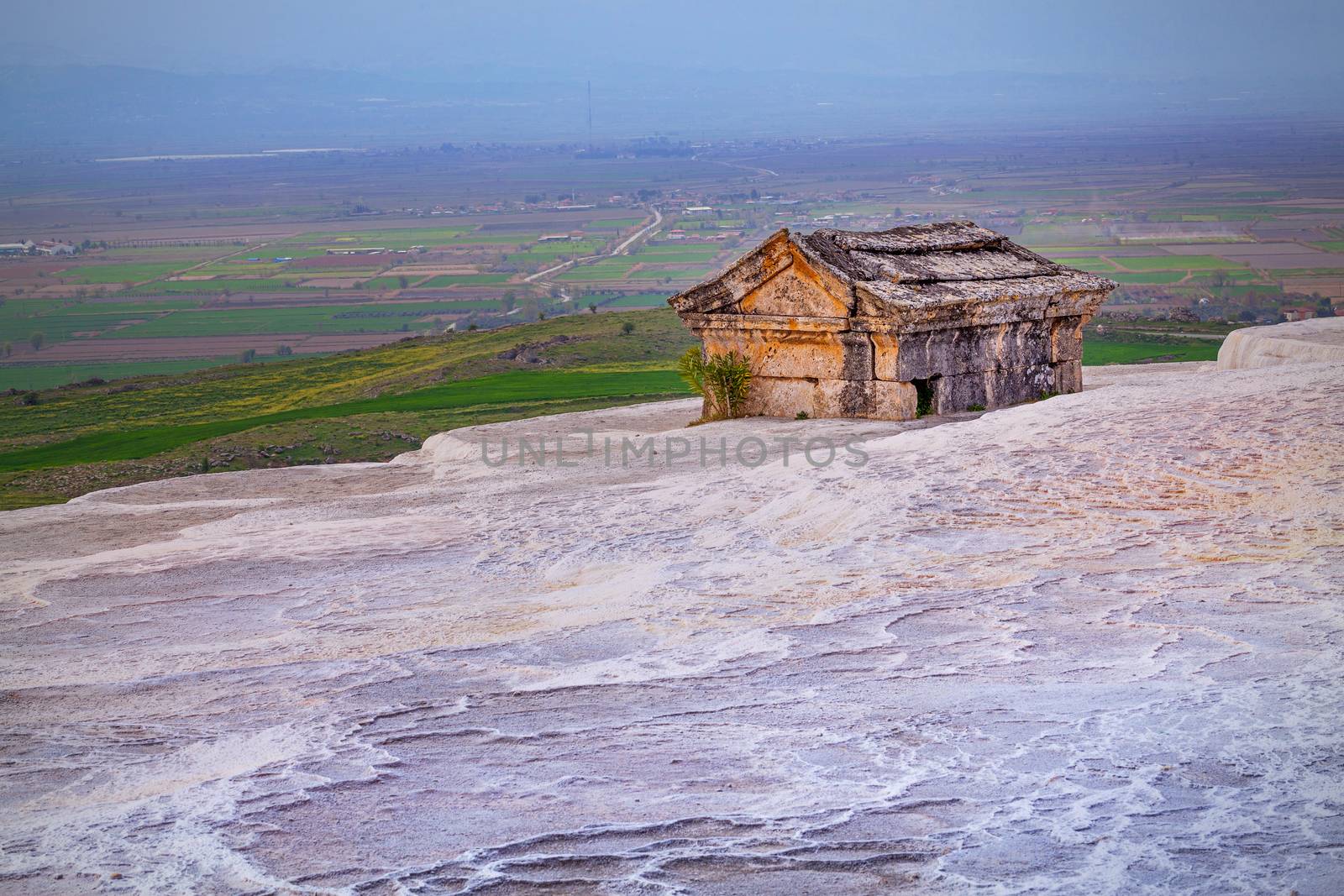 Ancient tomb on Travertine hills in Hierapolis near Pamukkale, Turkey by igor_stramyk