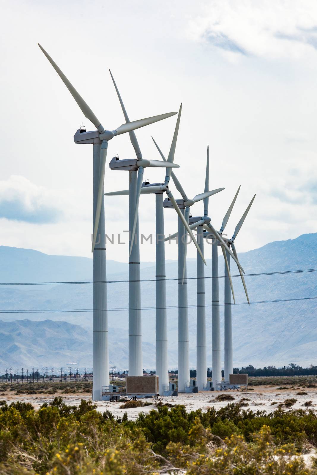 Dramatic Wind Turbine Farm in the Desert of California. by Feverpitched