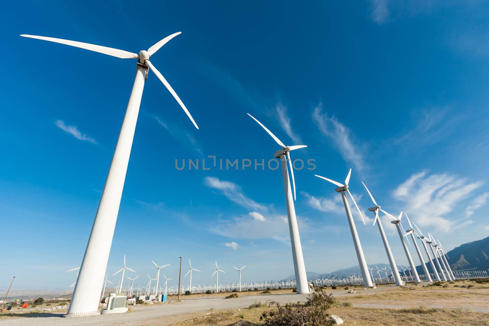 Dramatic Wind Turbine Farm in the Desert of California. by Feverpitched