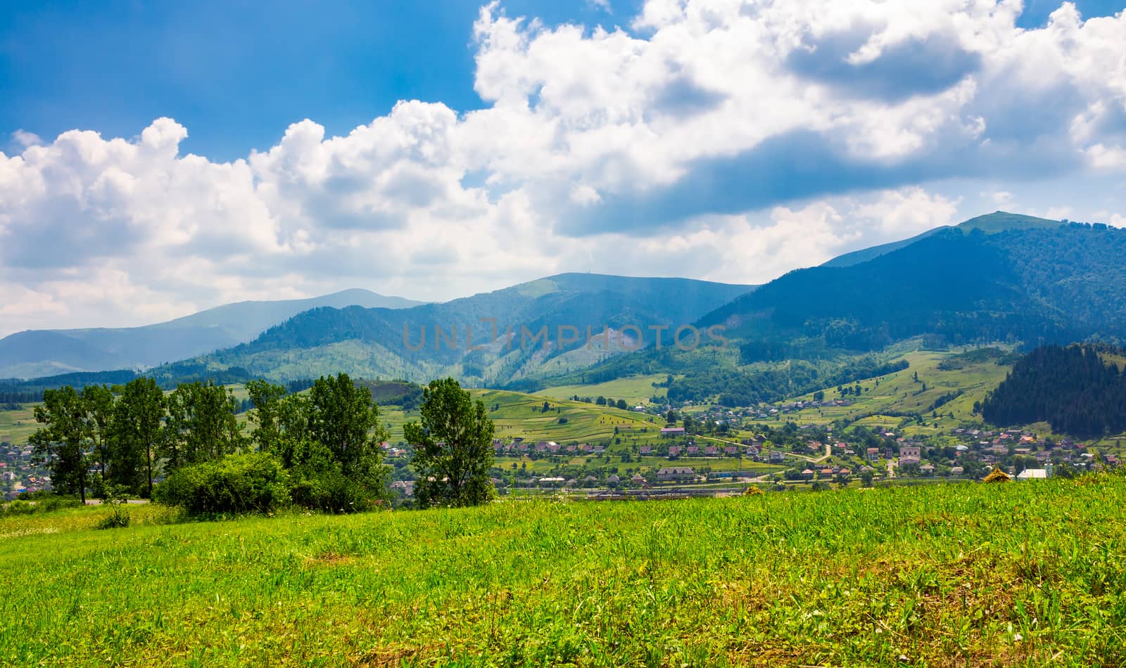 beautiful countryside of TransCarpathian town Volovets. spectacular early autumn scenery in mountains at sunrise