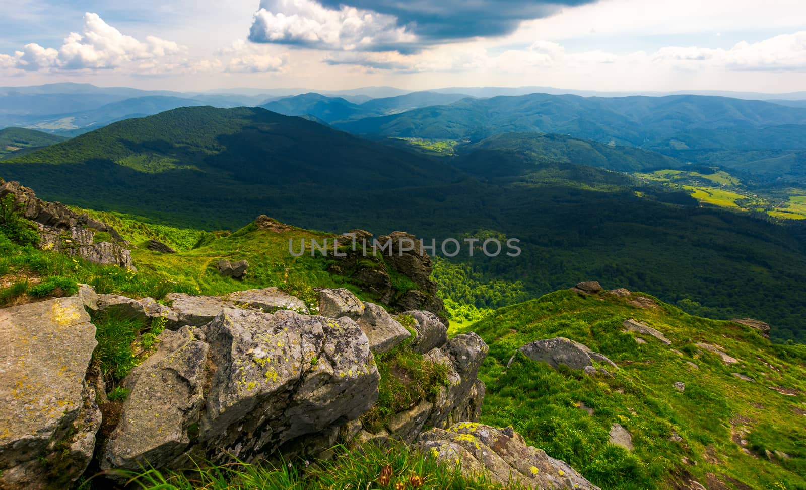 path to a tiger face cliff above the valley. spectacular landscape of Carpathian mountains in summertime. location Pikui mountain, Ukraine