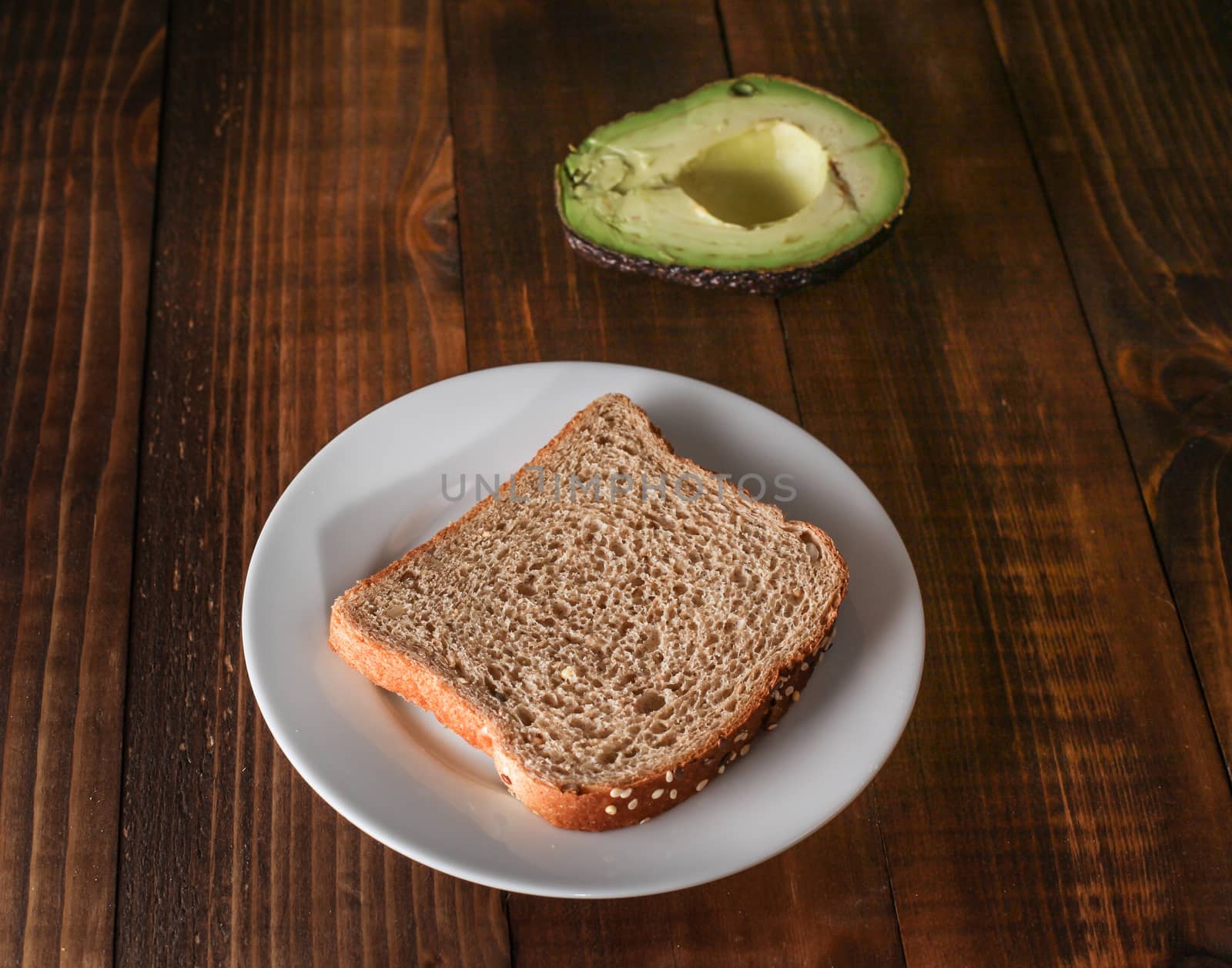 Table with avocado and bread