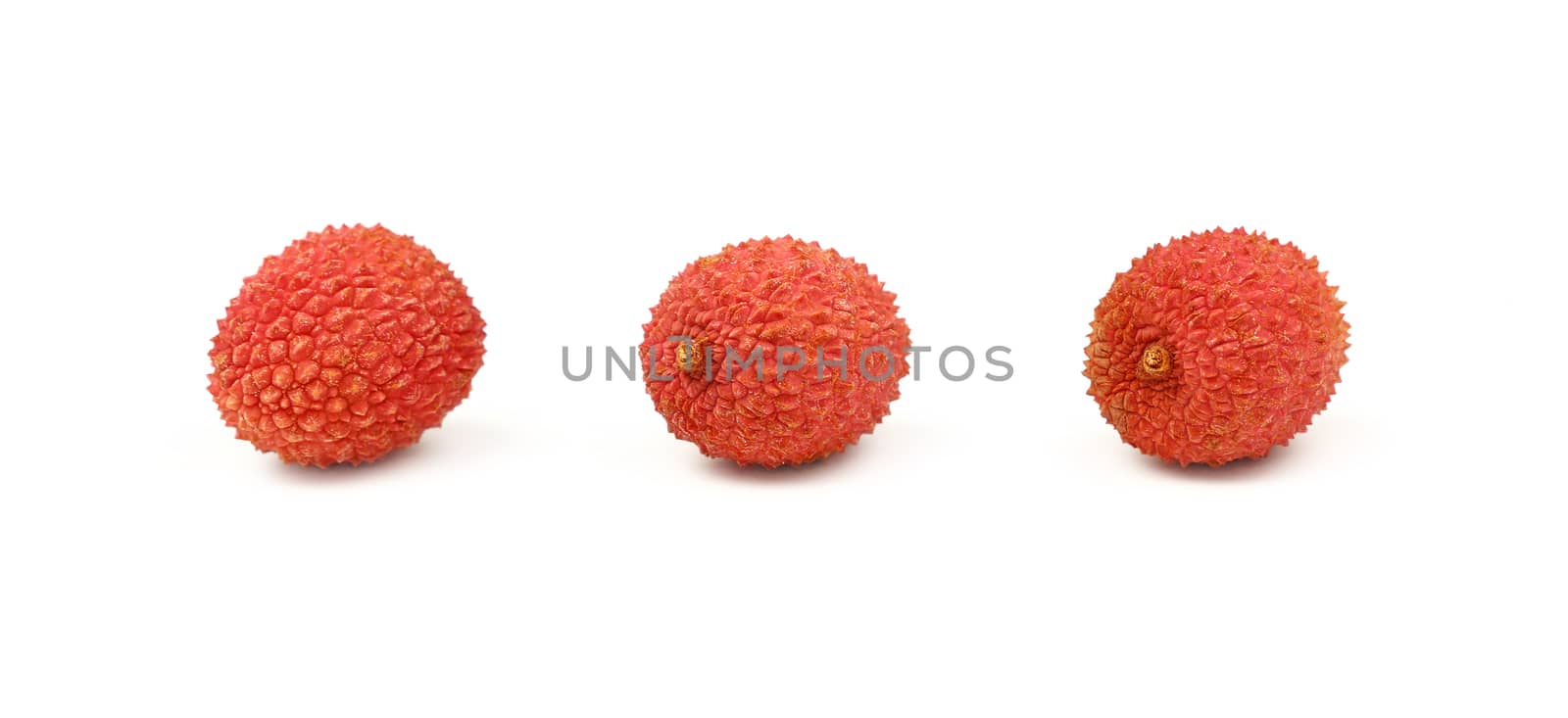Fresh red lychee isolated close up on white by BreakingTheWalls