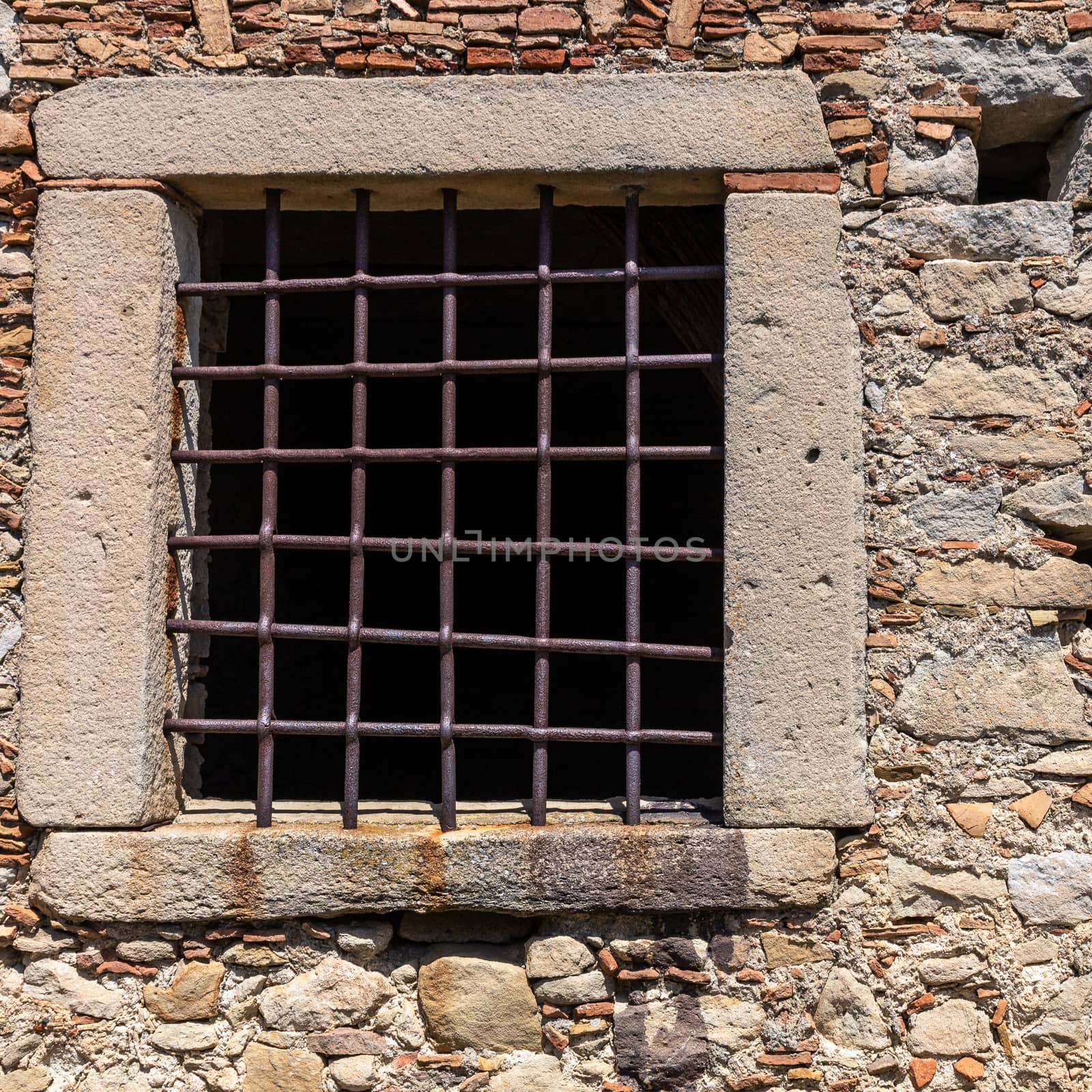 The broken window on stone wall, for background