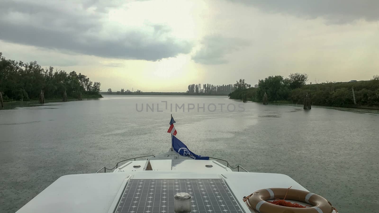 view from the boat to a river in venice at summer