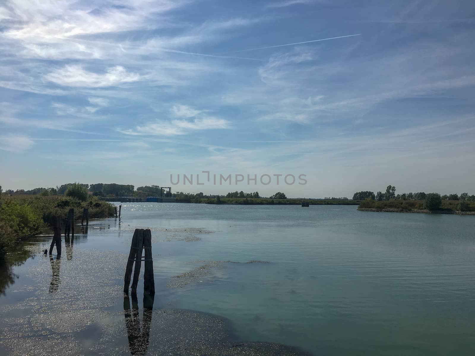 shipping trough a canal to venice at summer