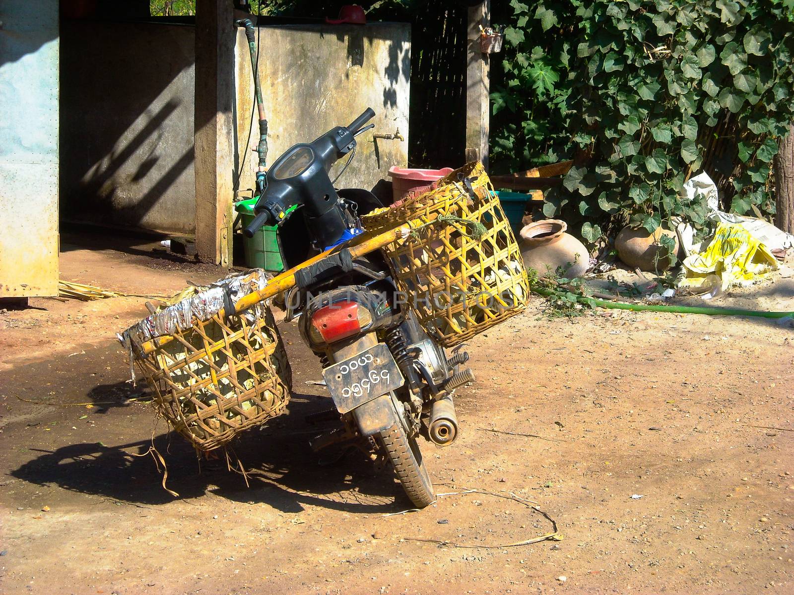 a moped with souvenirs in burma at the tour