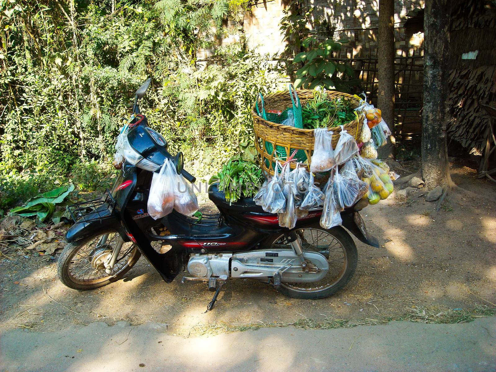 a moped with souvenirs in burma at the tour