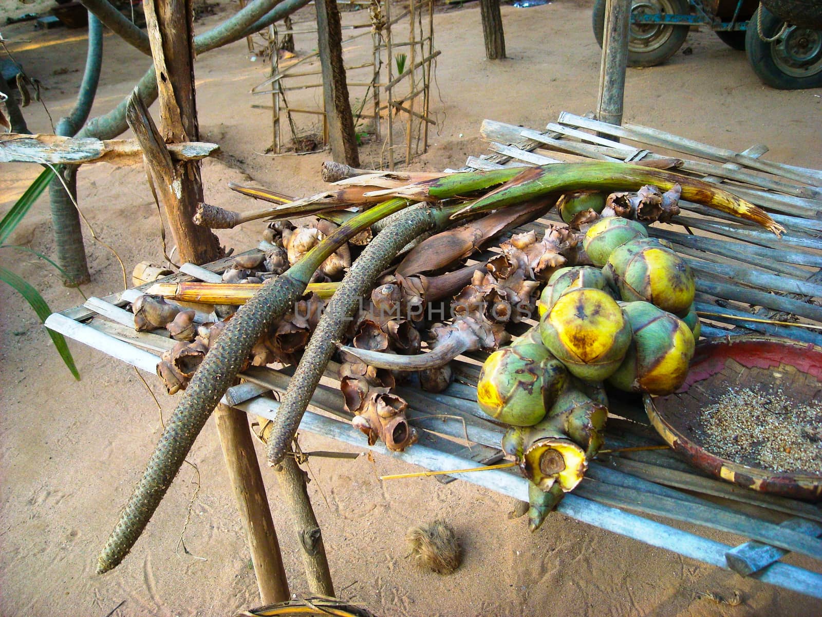 a stand with fruits in a market at burma