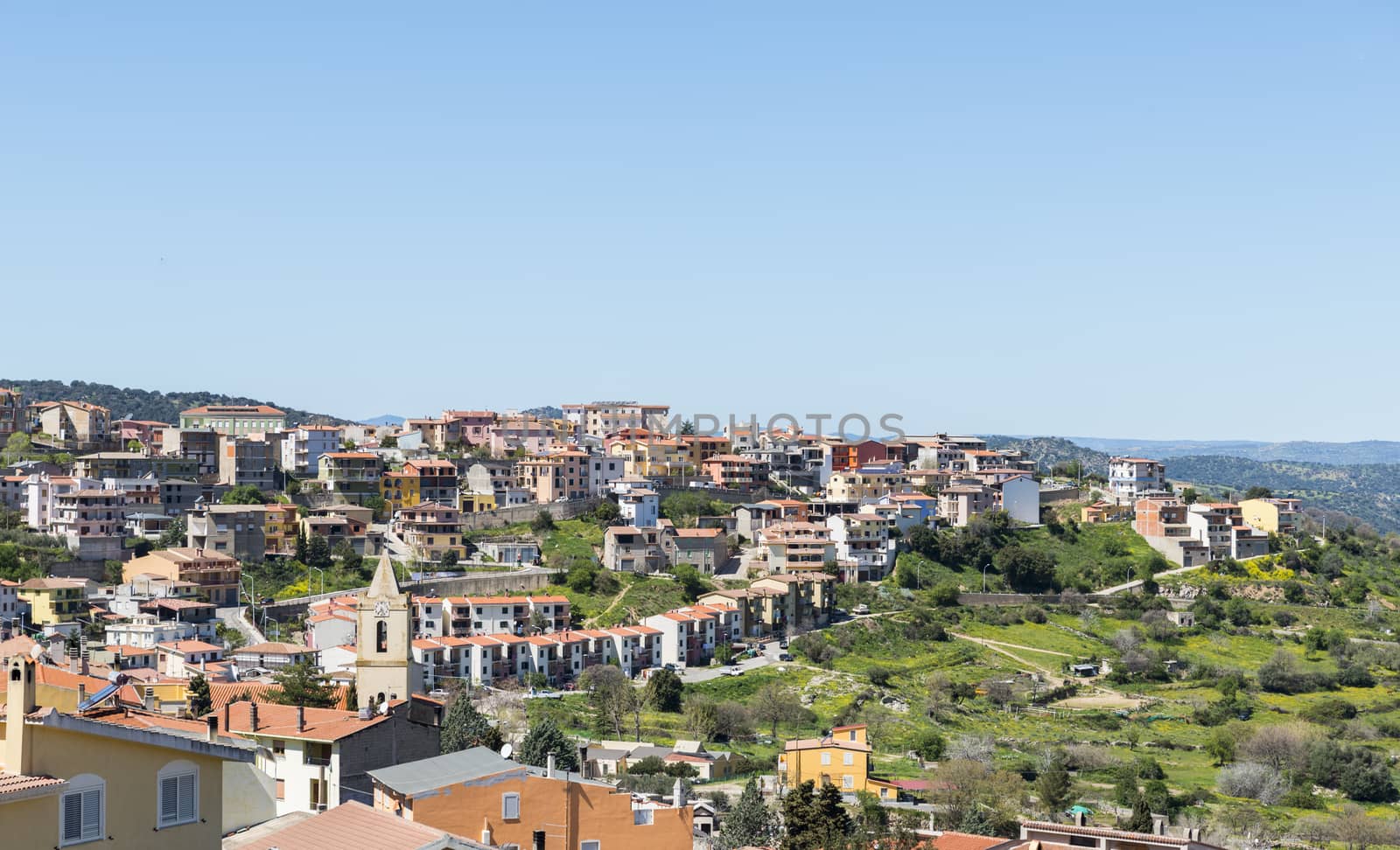 skyline of orgosolo city on sardinia island by compuinfoto