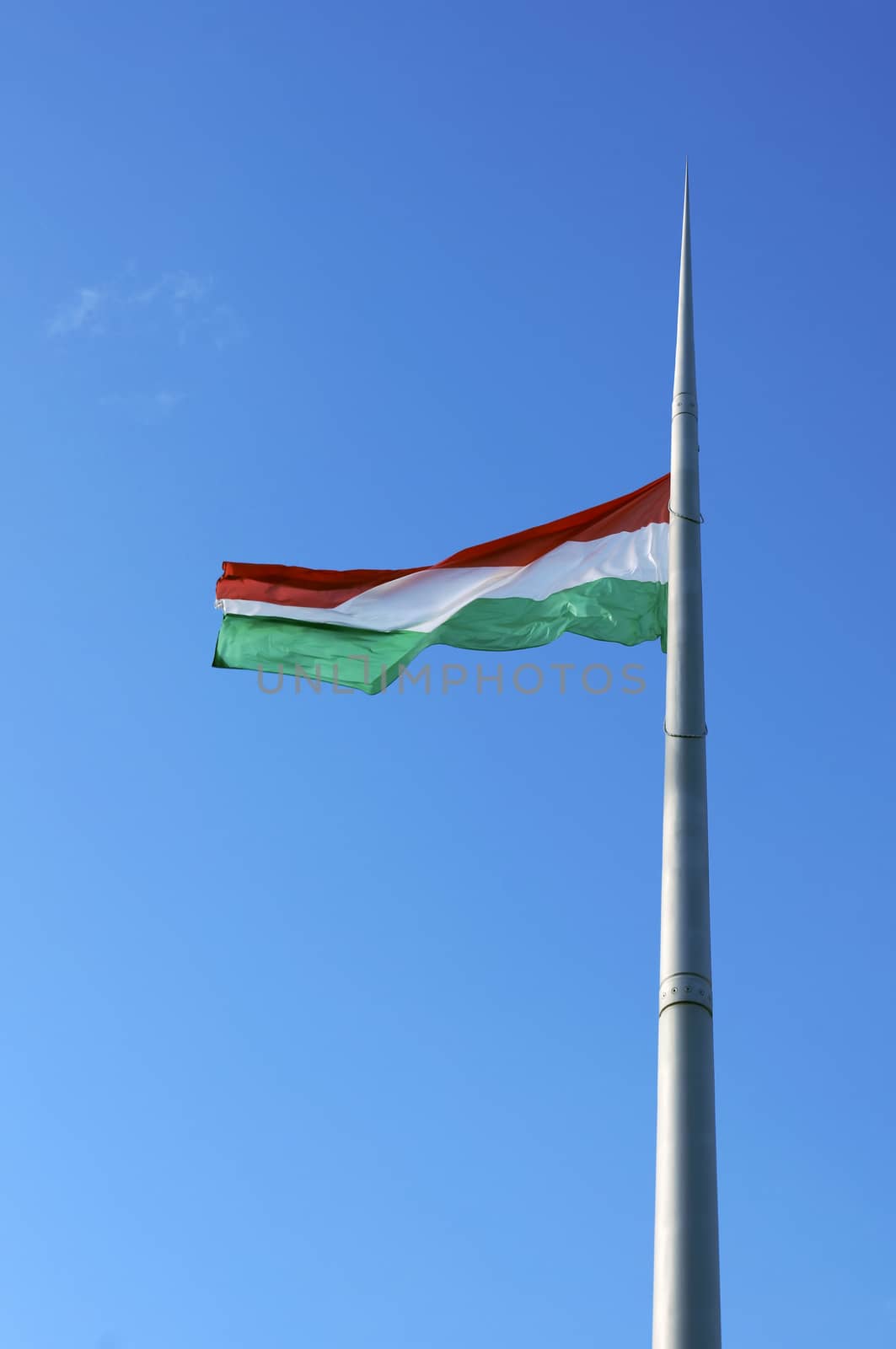 Hungarian national flag on the mast 