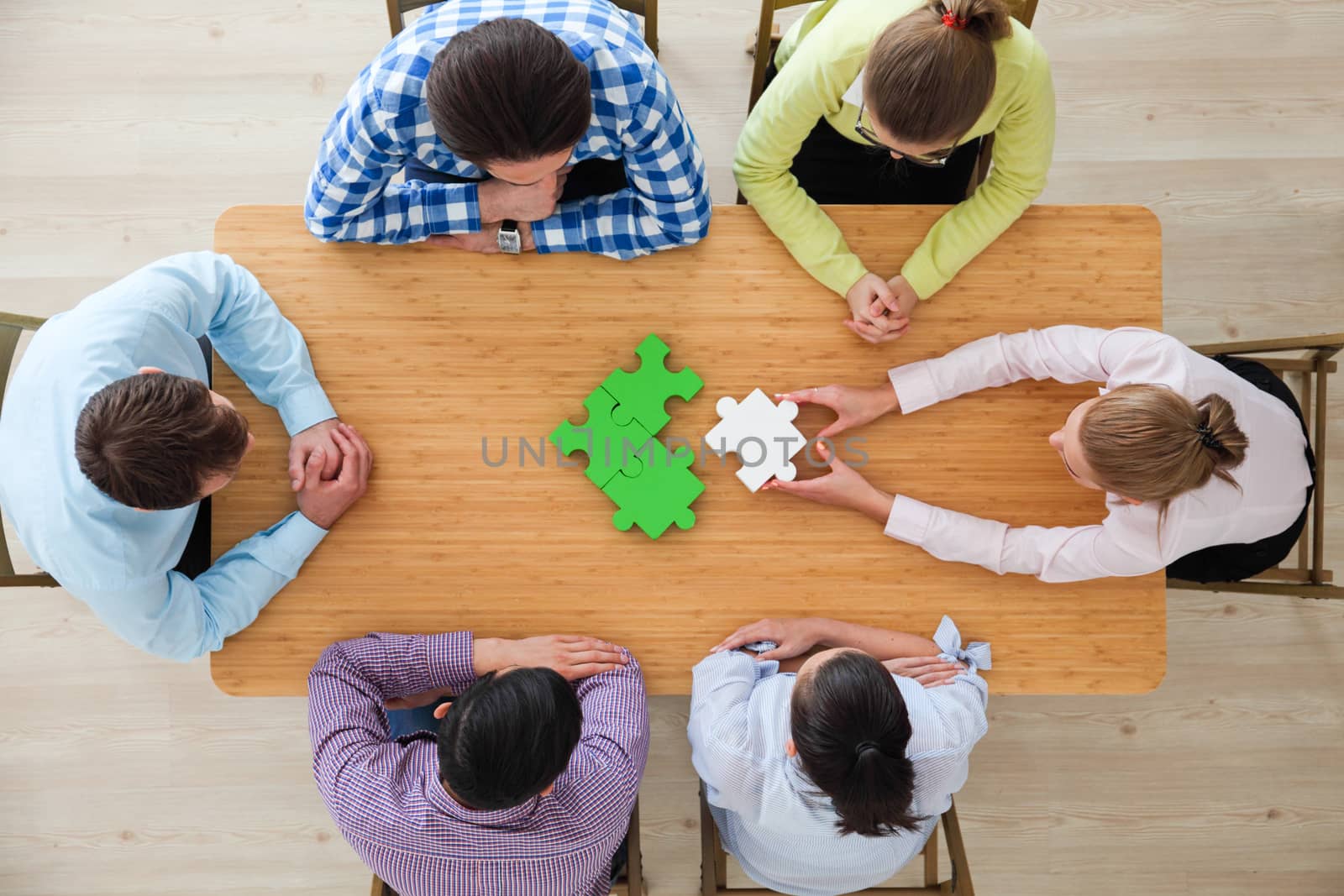 Hipster business successful teamwork concept, business people group assembling jigsaw puzzle, top view