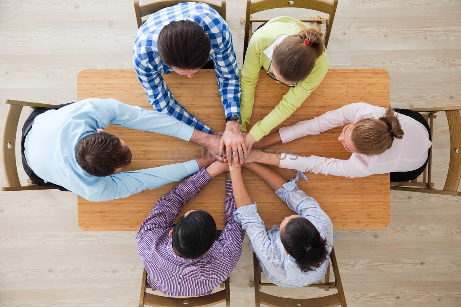 Business team stack hands, support concept, top view