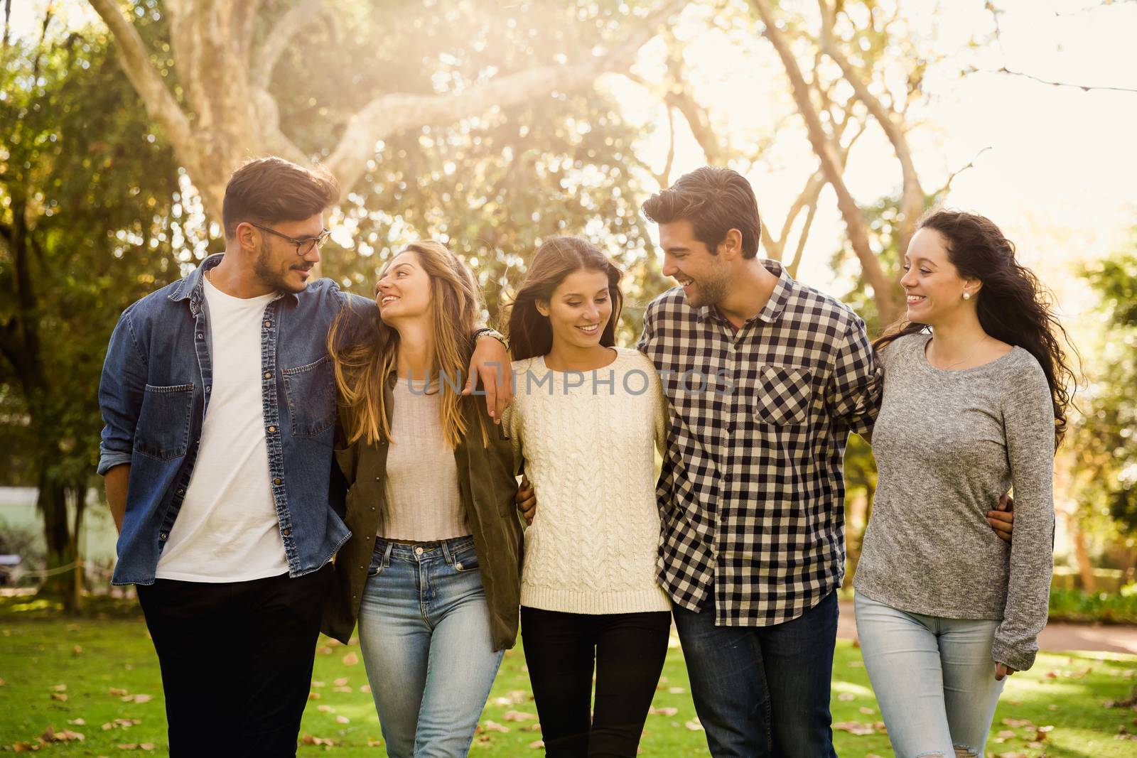 Group of friends having  a great day in the park