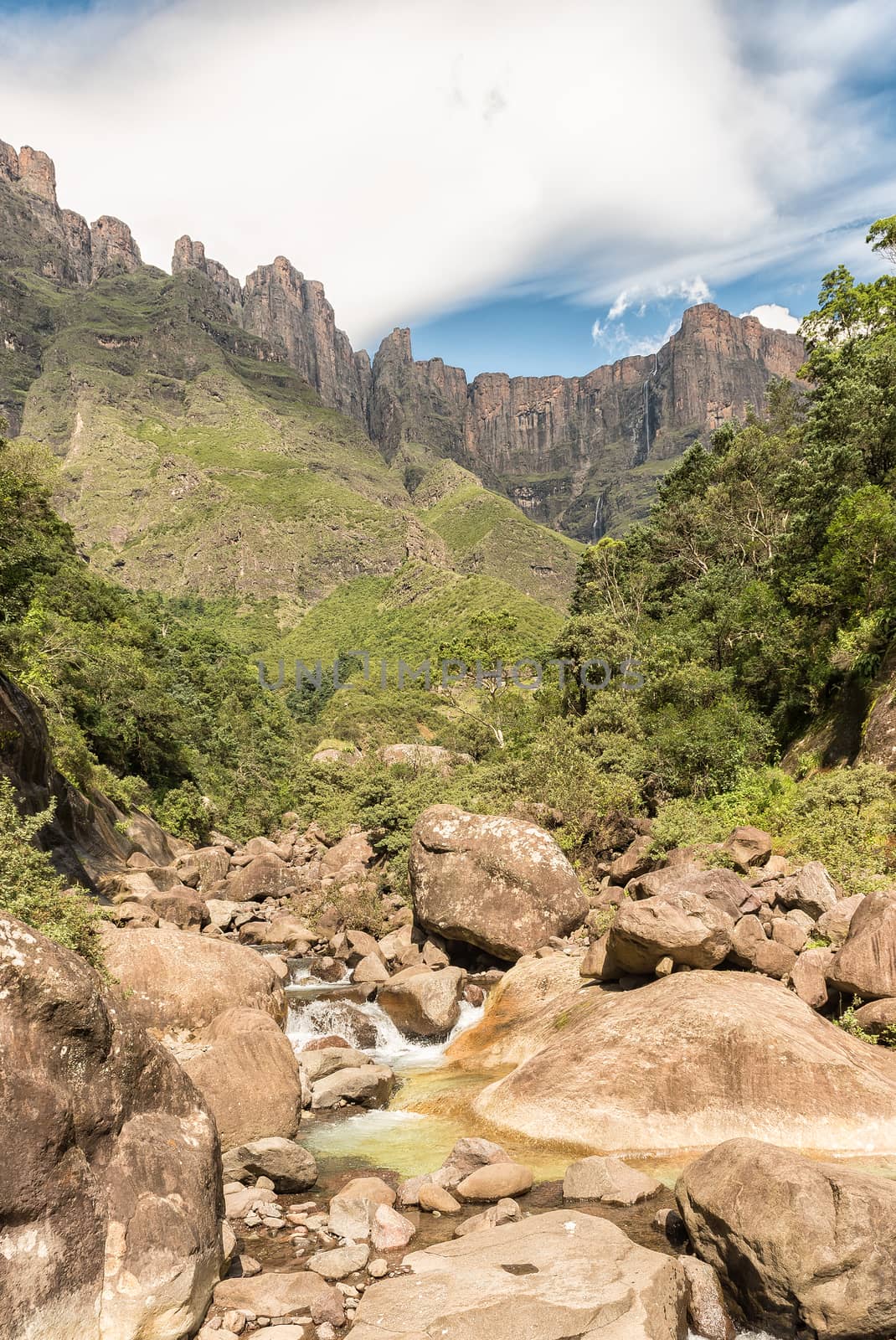 The Tugela River with the Tugela Falls, at 948 m, the 2nd tallest waterfall on earth. Seen from the far end of the Tugela Tunnel