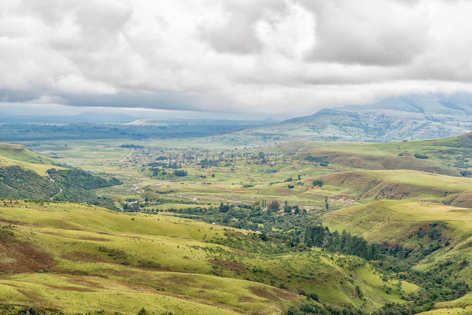 The view from Lookout Rock near Mahai in the Kwazulu-Natal Drakensberg. The Tugela river and the Bonjaneni township are visible