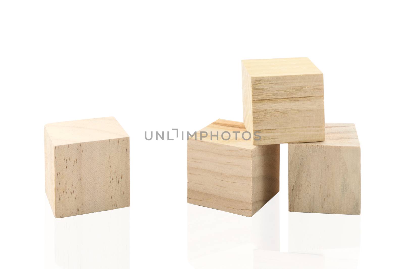 Wooden Building Blocks isolated against white background by Njean