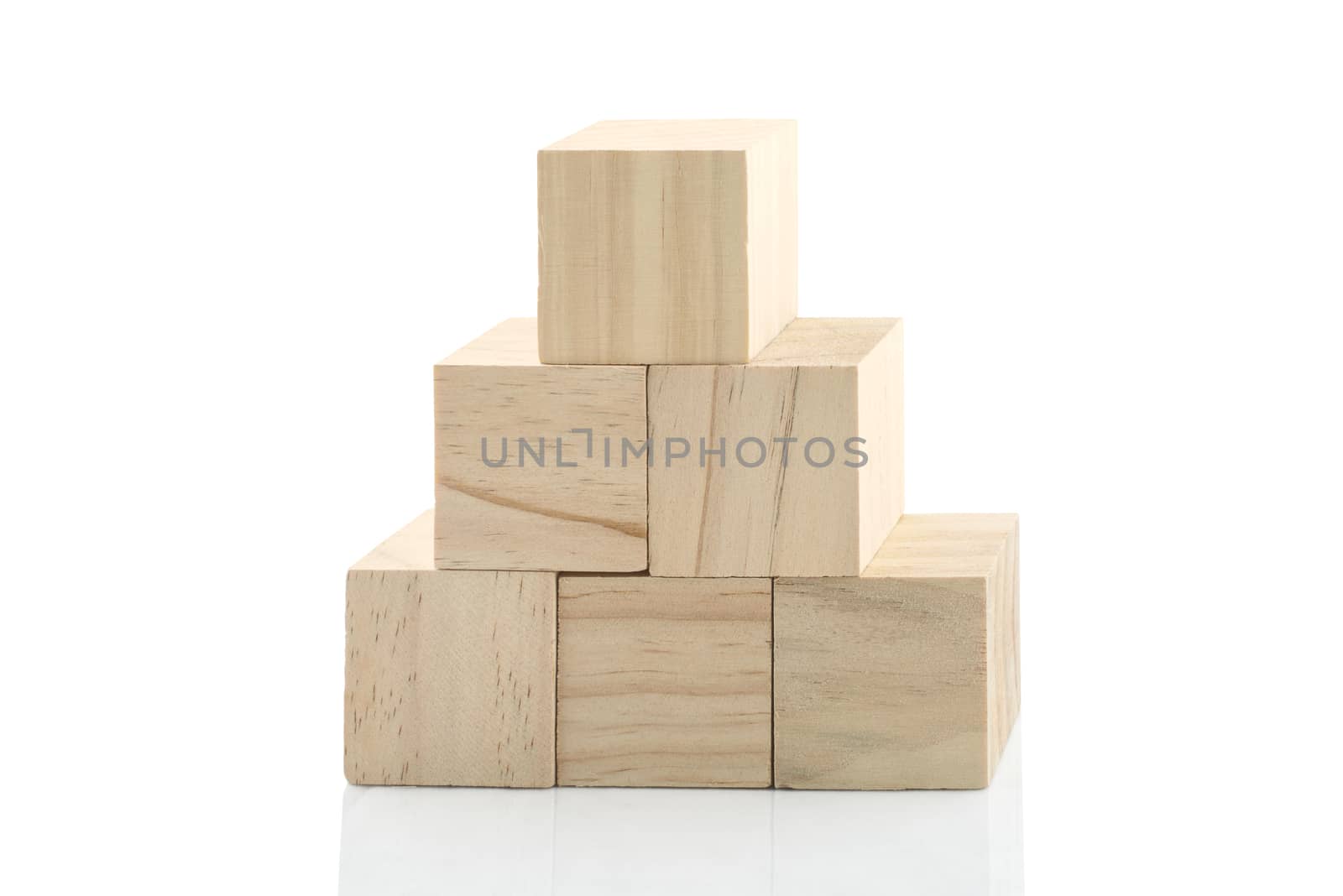 Wooden Building Blocks isolated against white background by Njean