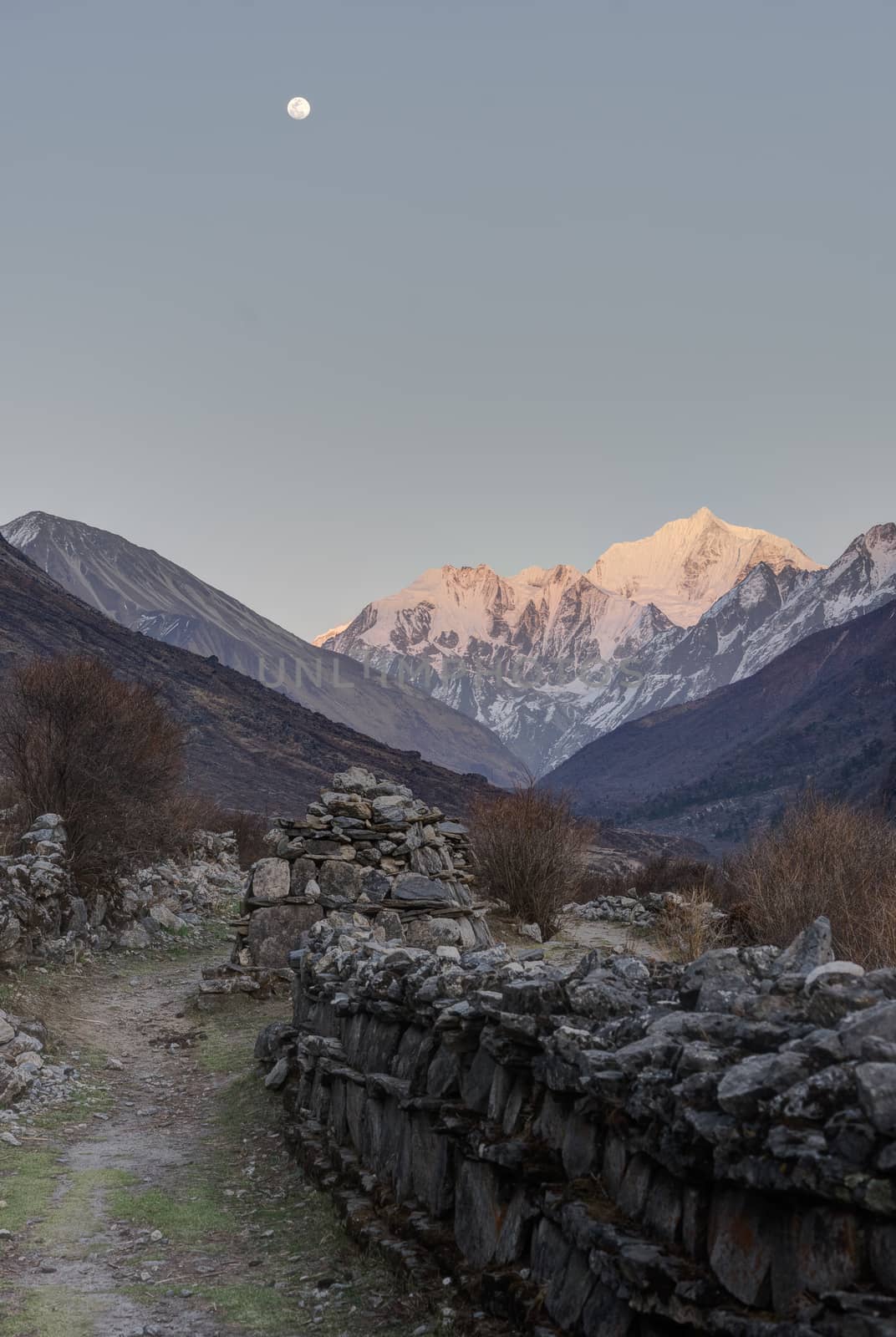 Moon and old wall ruin in Nepal trek