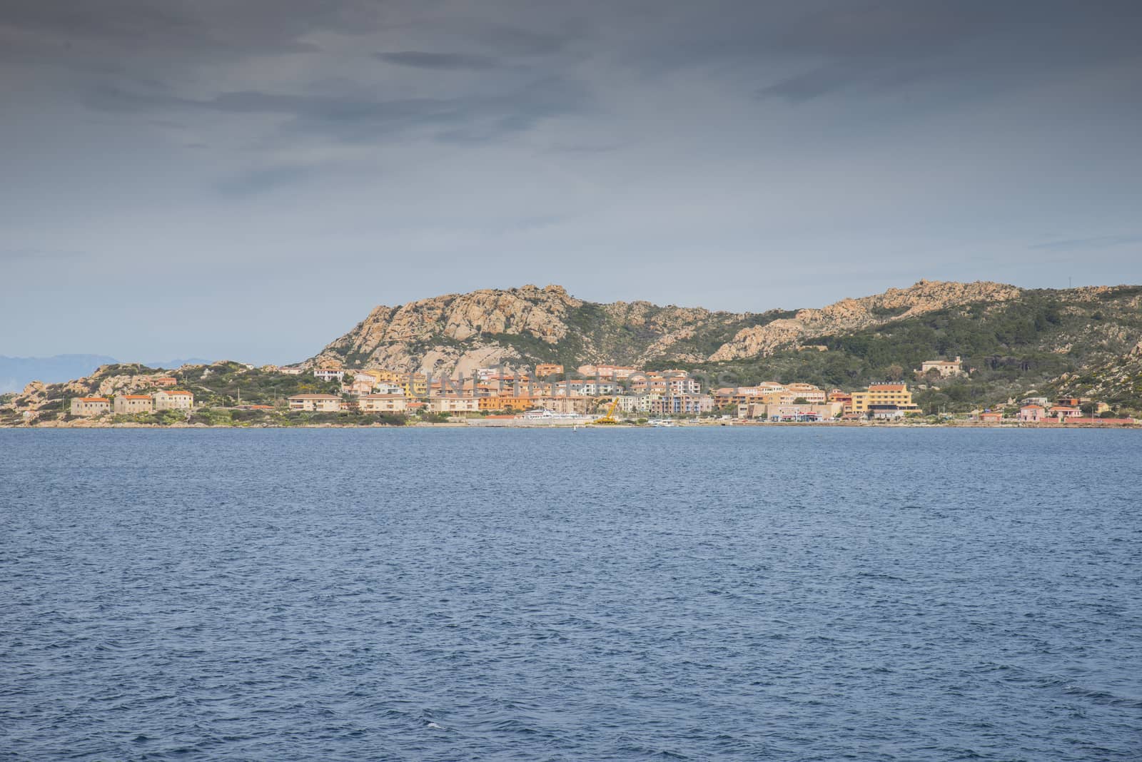 skyline of the island maddalena with the city la maddalena seen from the ferry from sardinia tyo the island
