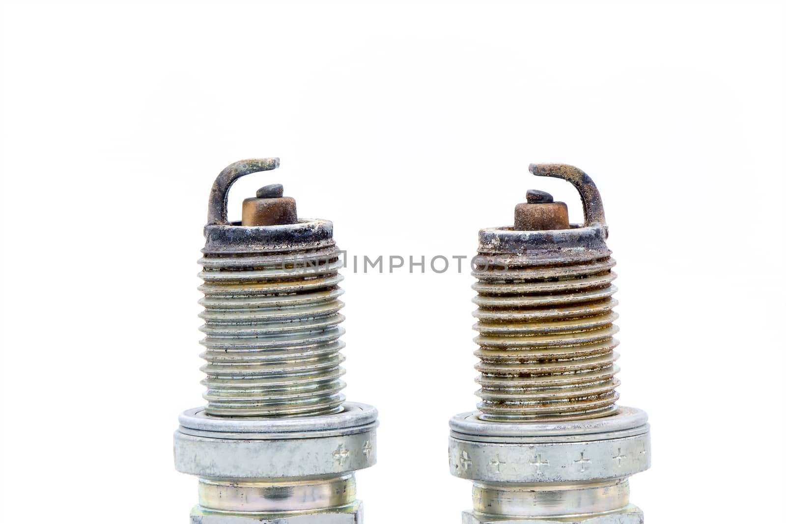 Old spark plug isolated on the white by ahimaone