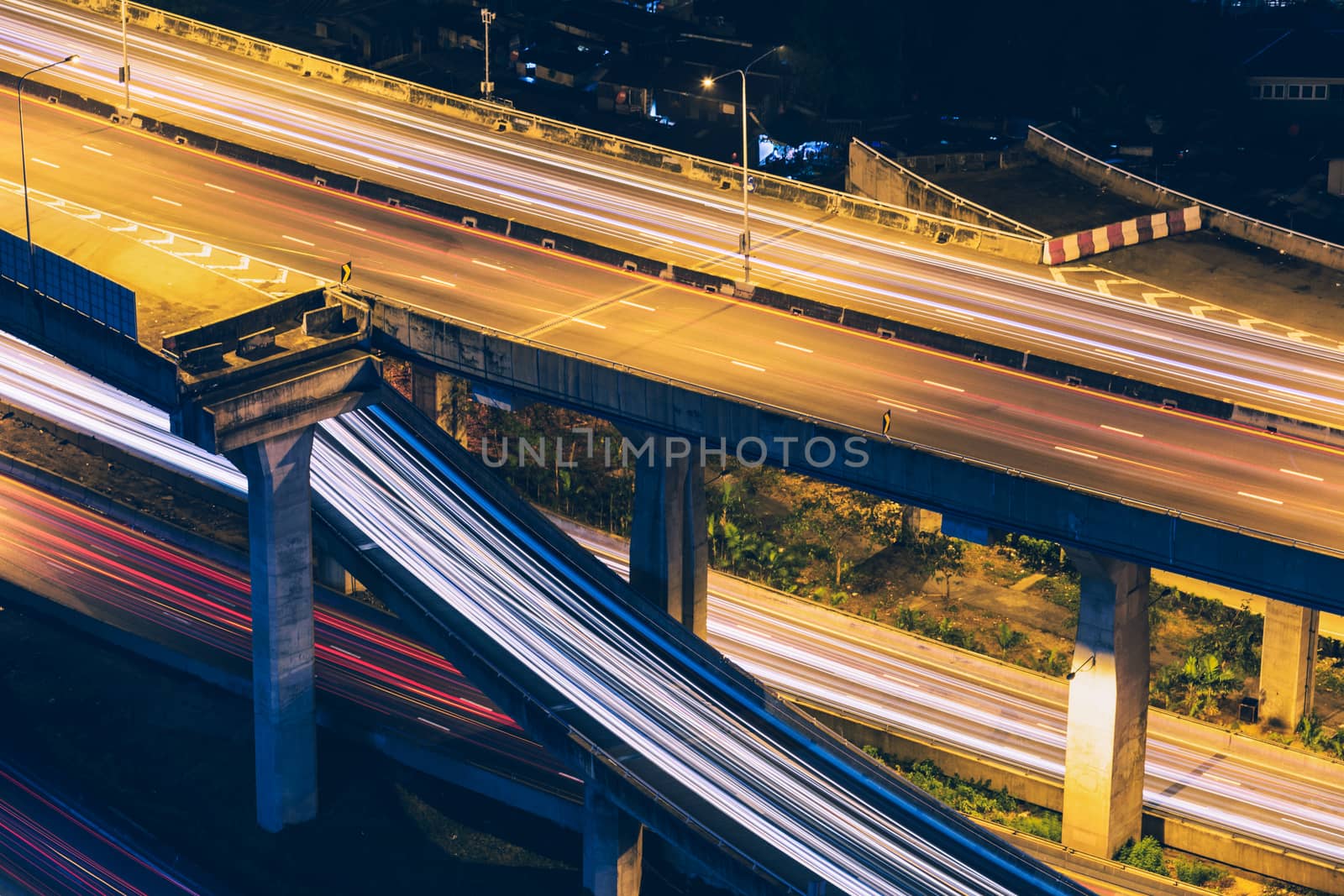 Light trails on express highway at night, long exposure abstract by ahimaone