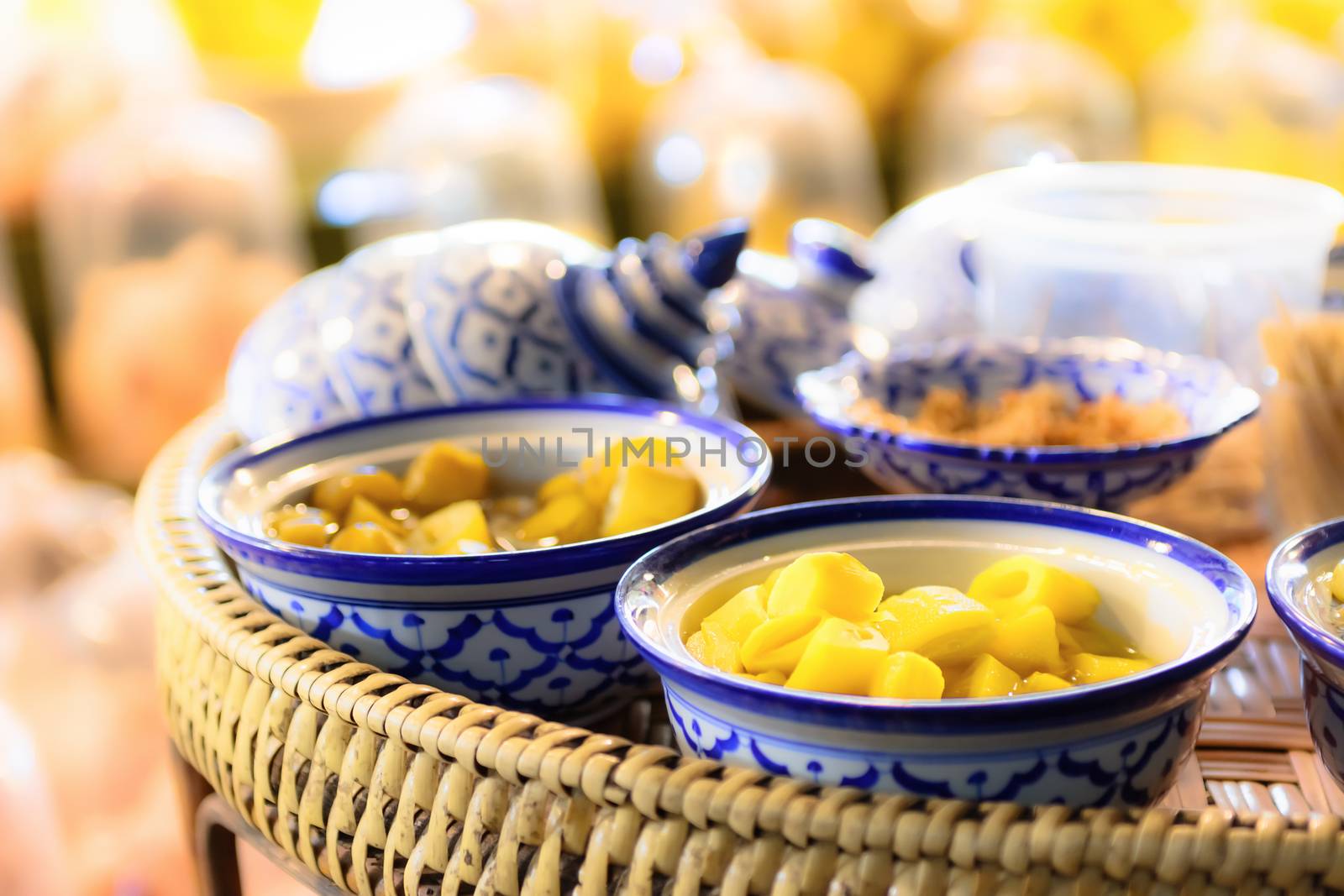 Preserved vegetables and fruits in vintage bowl by ahimaone