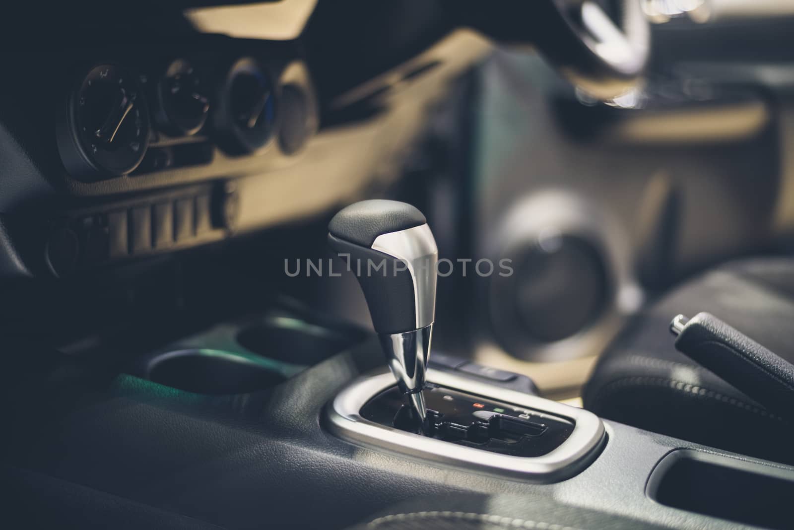 Automatic gear stick inside modern car  for background by ahimaone