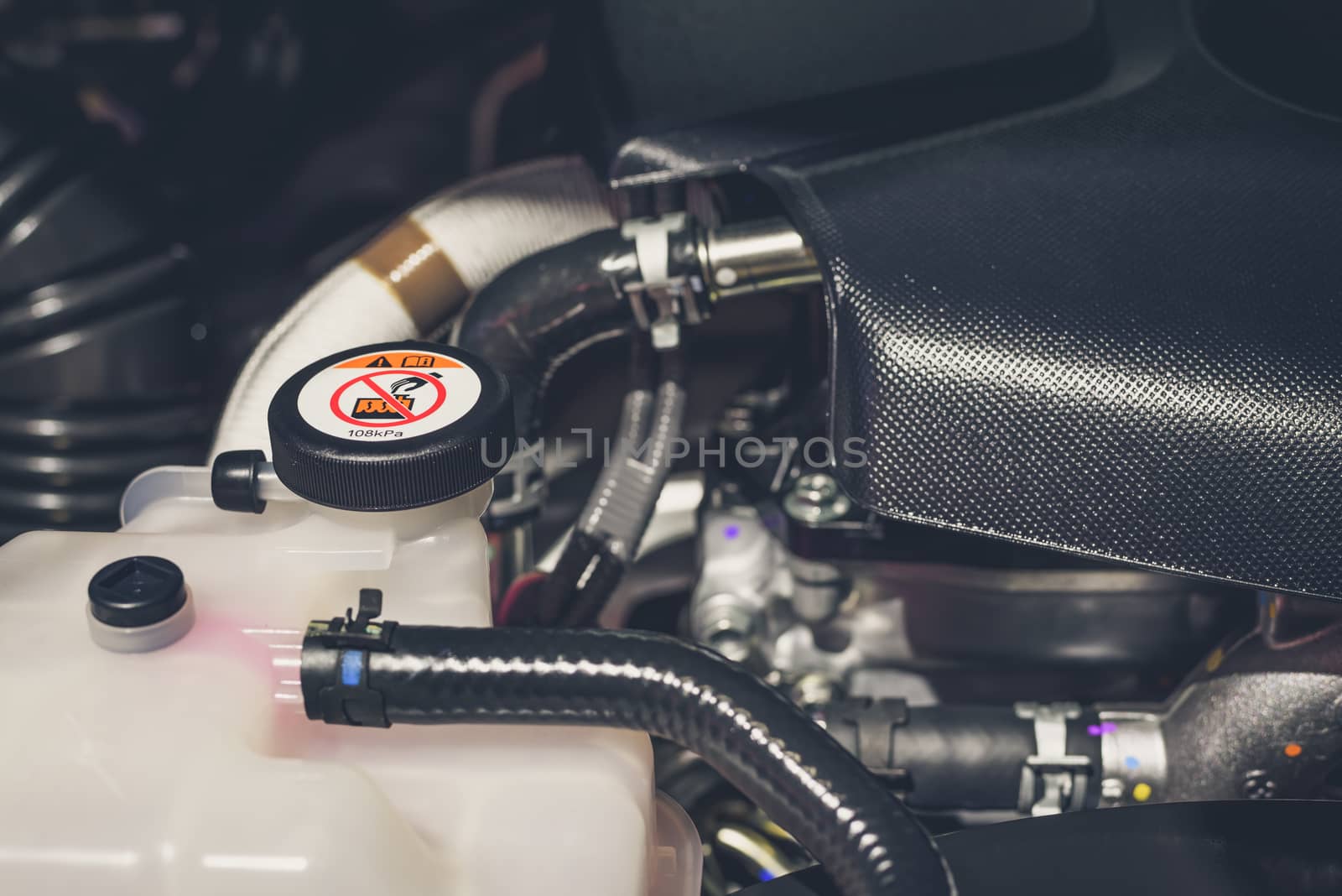 Coolant tank and warning information in engine room