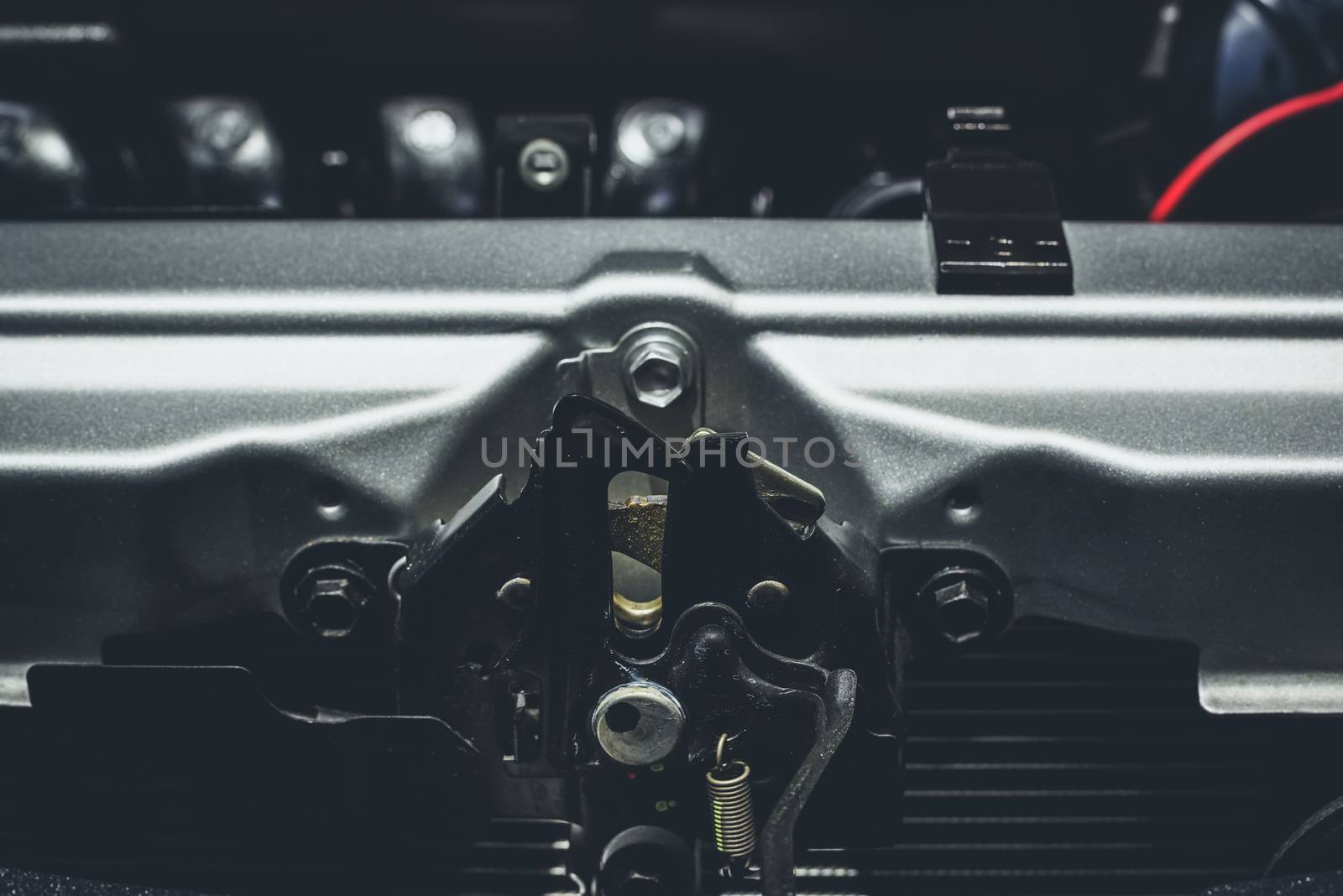 Close up details of car engine, bonnet and hood lock system by ahimaone