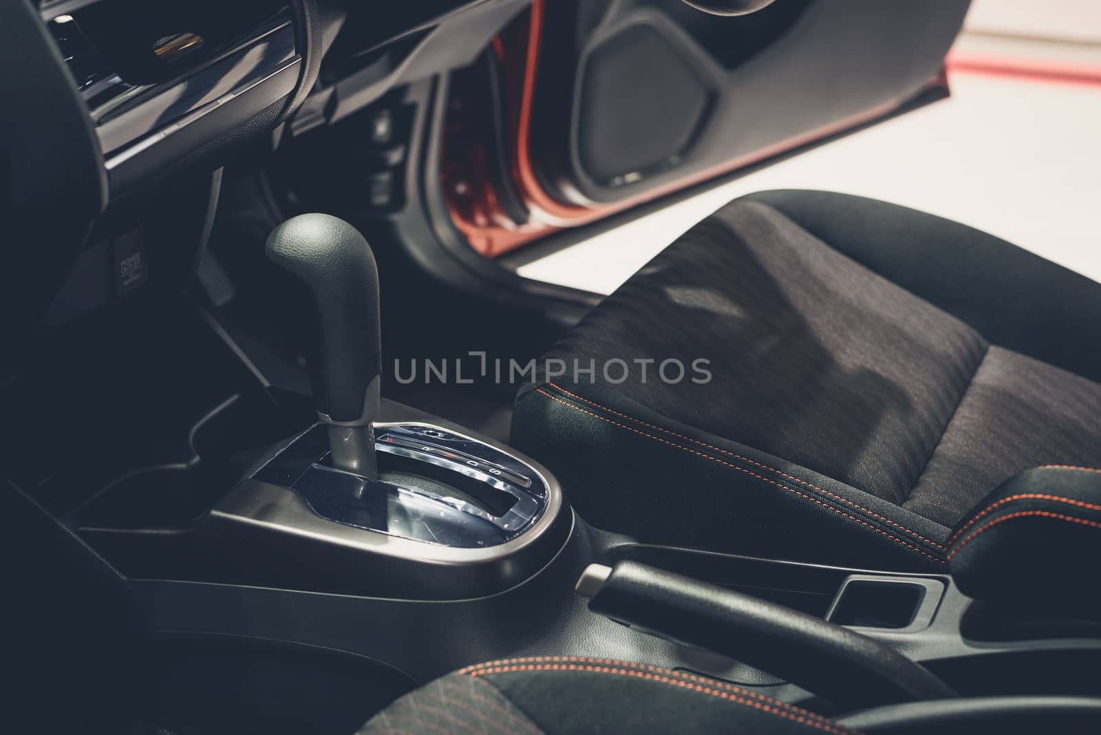 Automatic gear stick inside modern car  for background by ahimaone