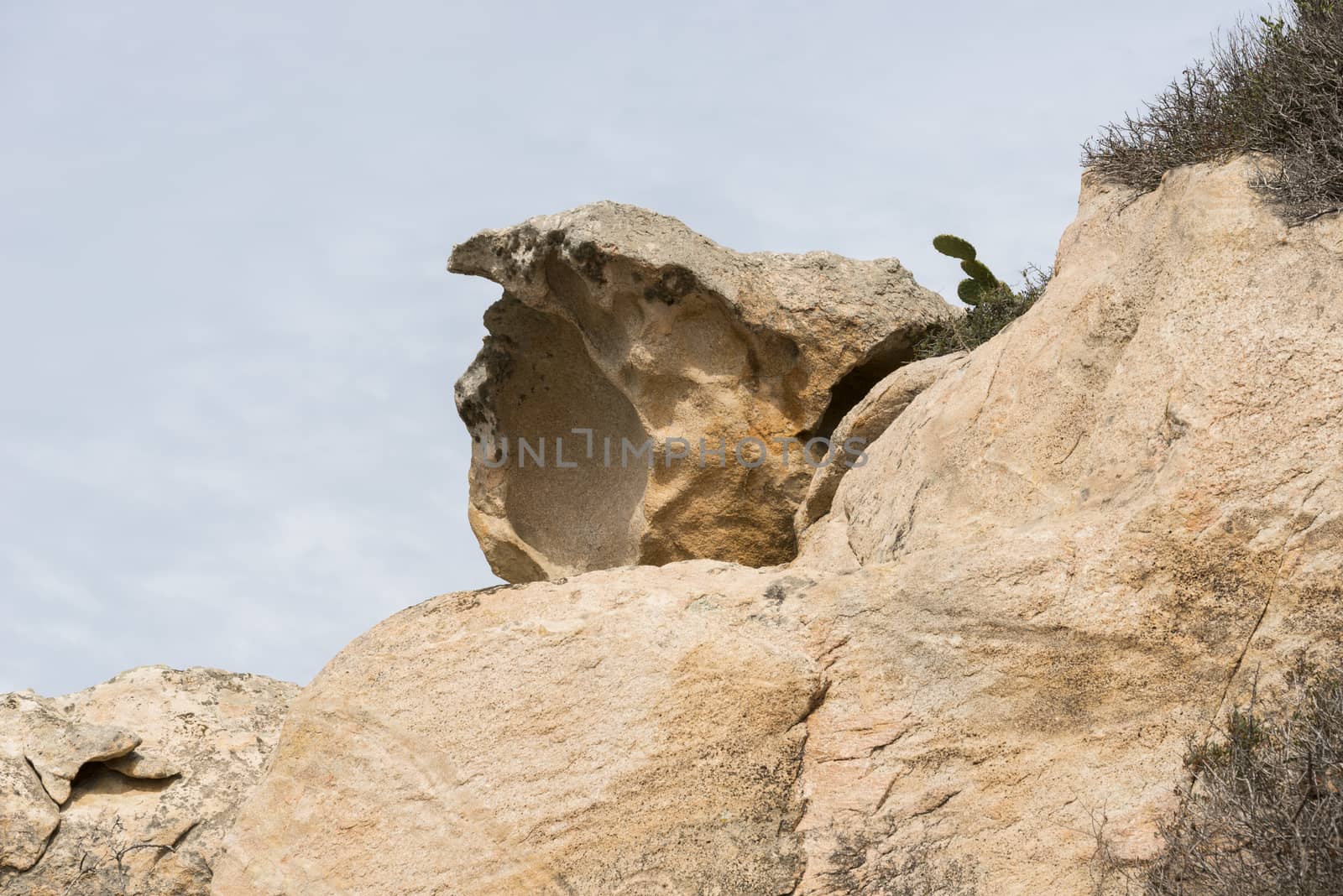 big rocks and blue sky as background by compuinfoto