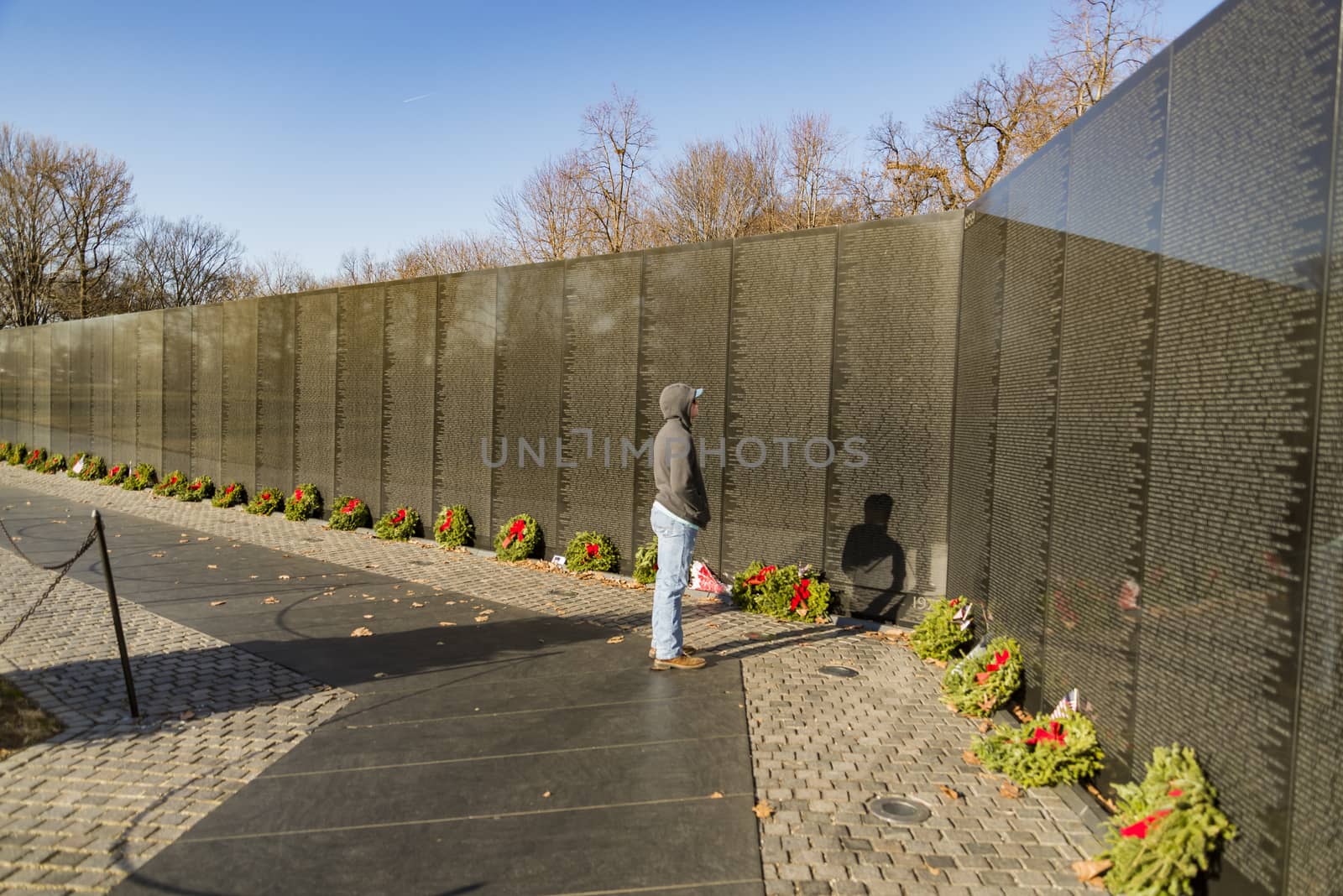 WASHINGTON DC -December 17, 2017: Names on Vietnam War Veterans Memorial on December 17, 2017 in Washington DC, USA. The memorial receives around 3 million visitors each year.