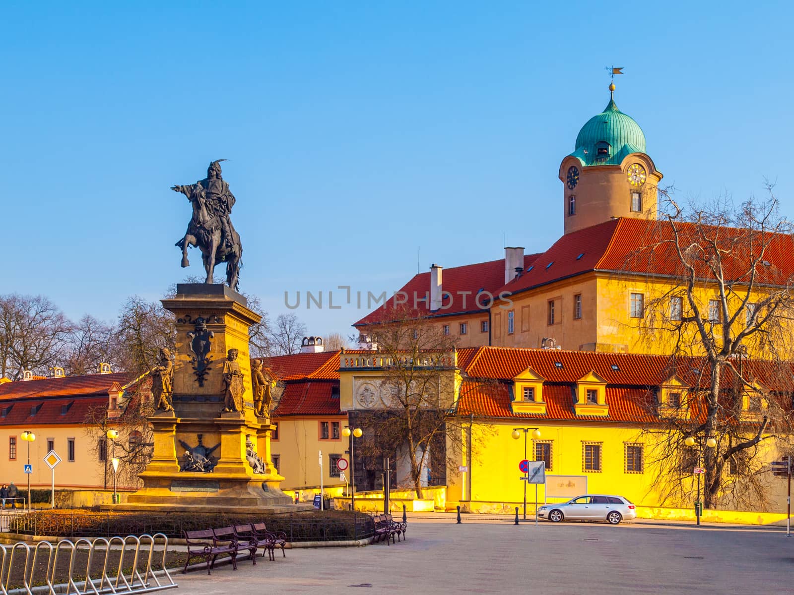 Statue of Jiri z Podebrad with castle on background, Podebrady, Czech Republic.