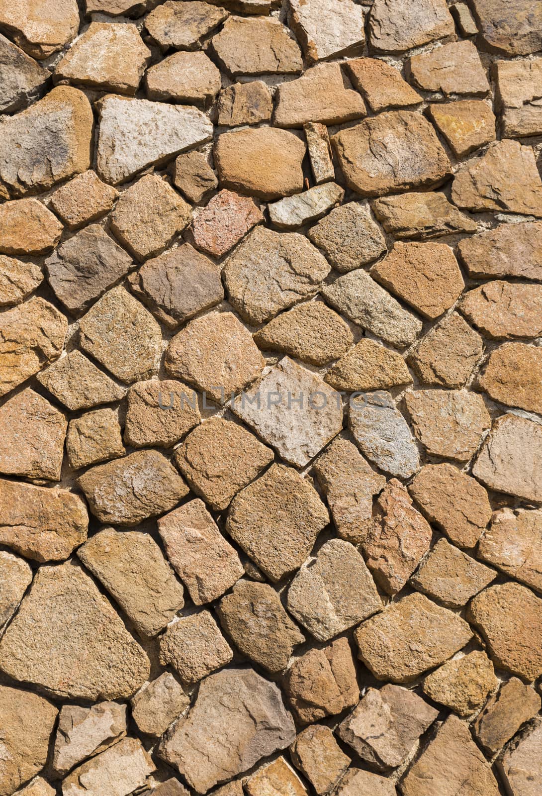 wall of old stones on the way they are build like ages on the island of sardinia