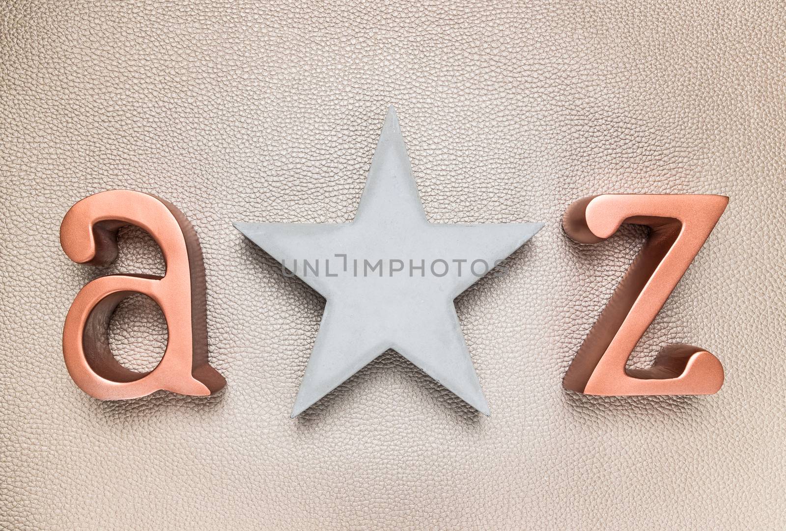 Concrete star and metal letters A and Z by anikasalsera