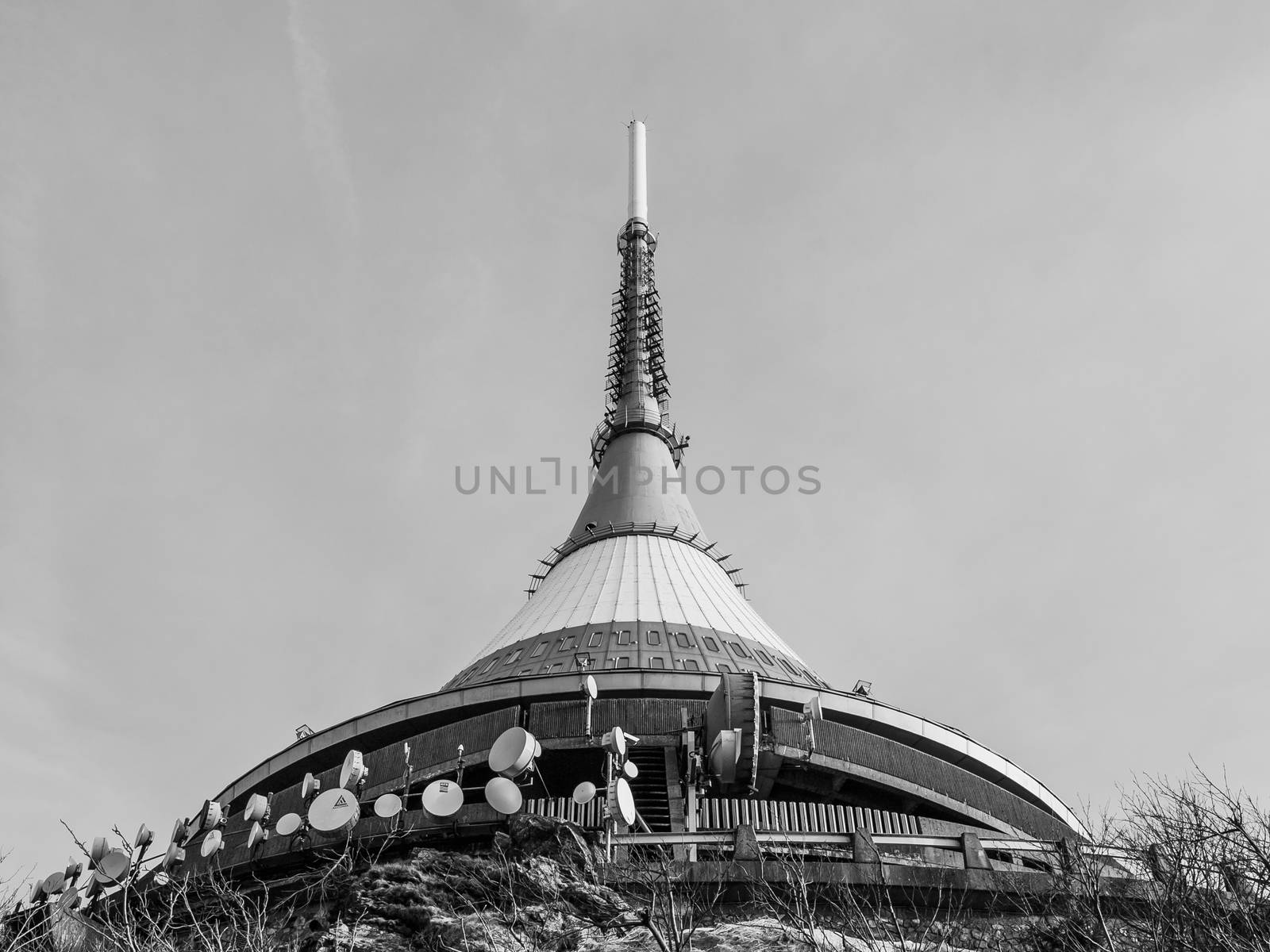 Jested - unique architectural building. Hotel and TV transmitter on the top of Jested Mountain, Liberec, Czech Republic. Black and white image.