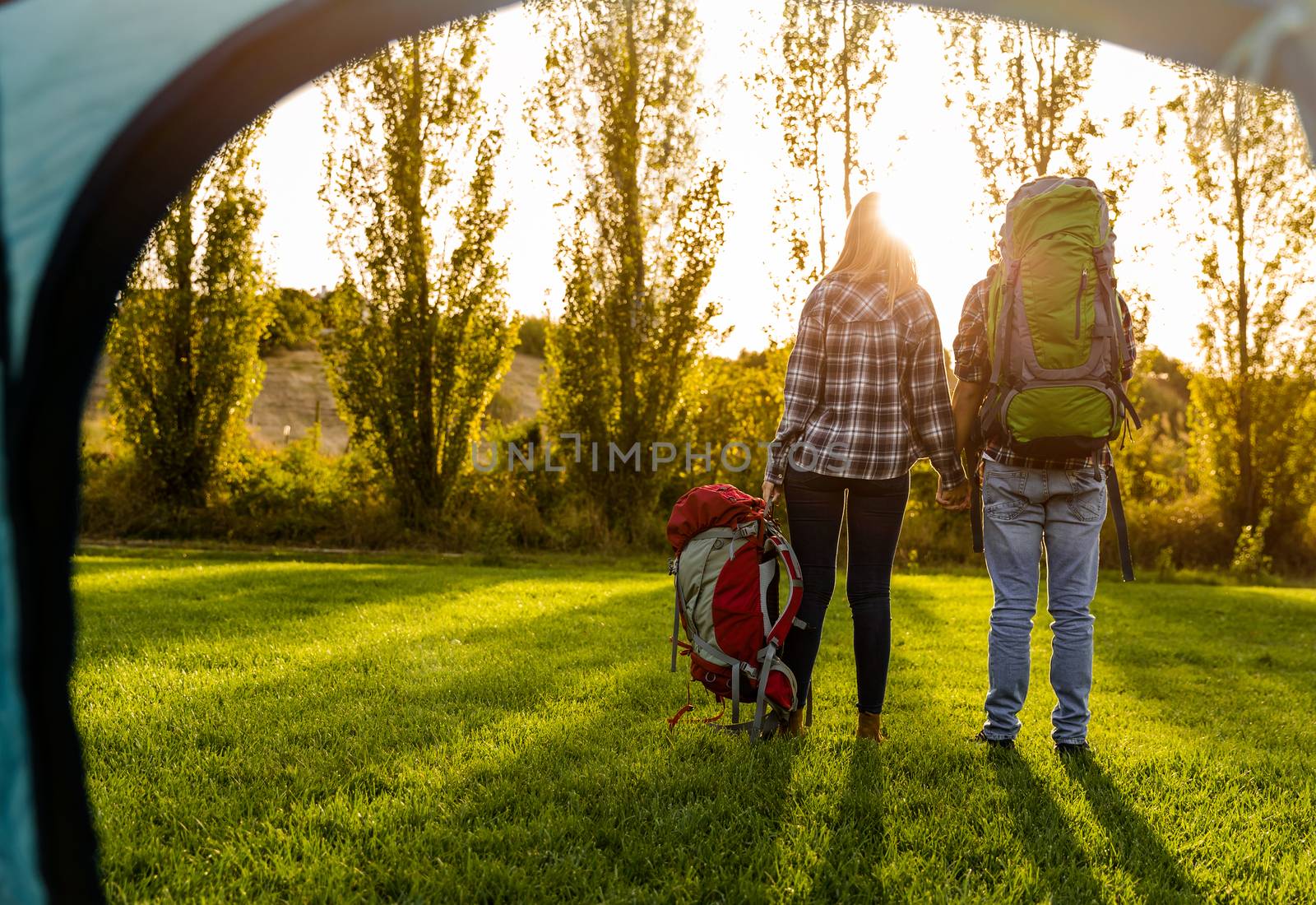 Shot of a young couple with backpacks ready for camping