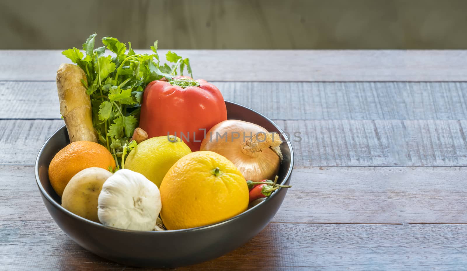 Fresh vegetables in a tray, Courgettes, onion, orange, lemon, tomato, potato