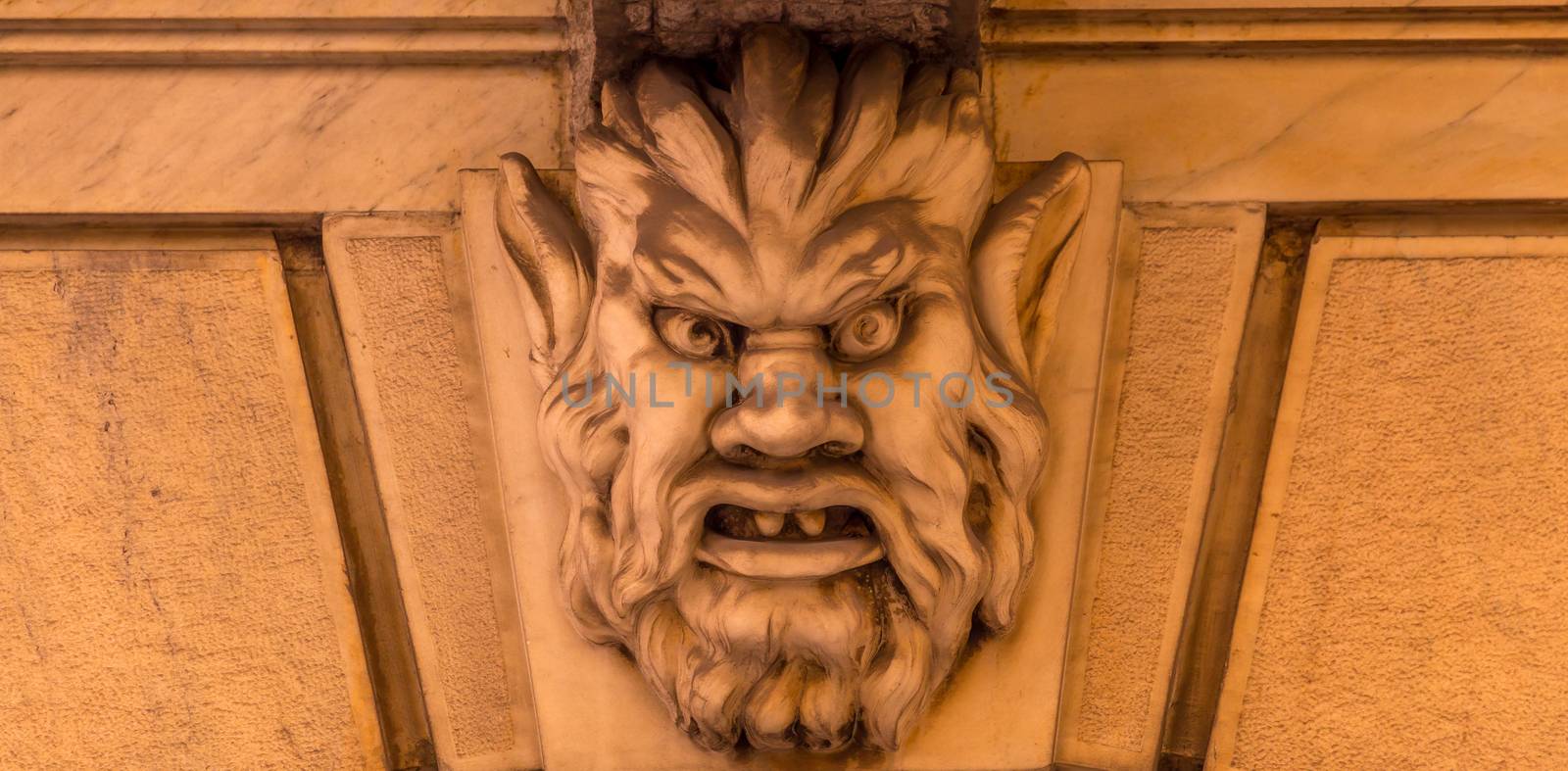 Italy, Turin. This city is famous to be a corner of two global magician triangles. This is a protective mask of stone on the top of a luxury palace entrance, dated around 1800