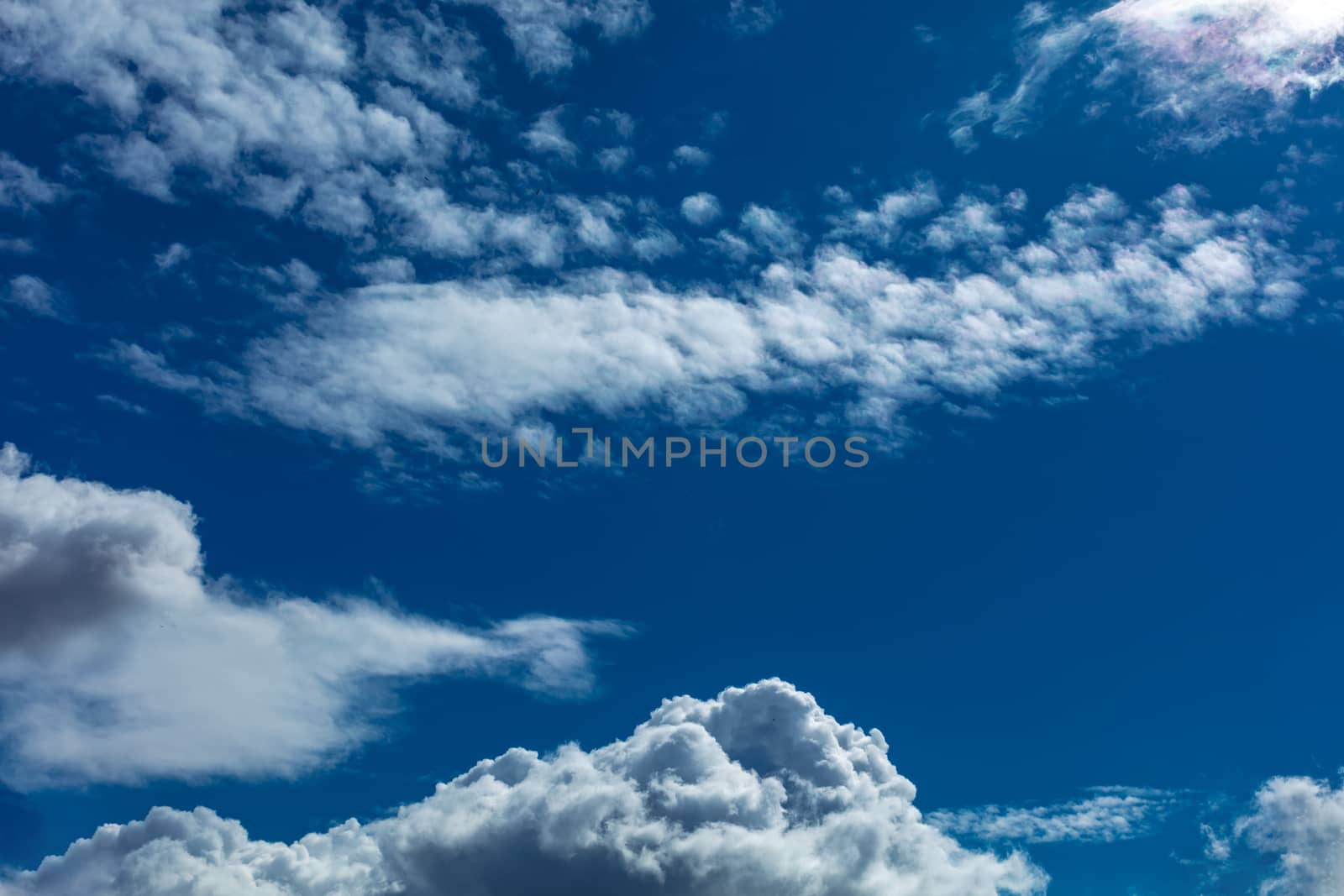 Light vivid blue serene majestic cloudscape background