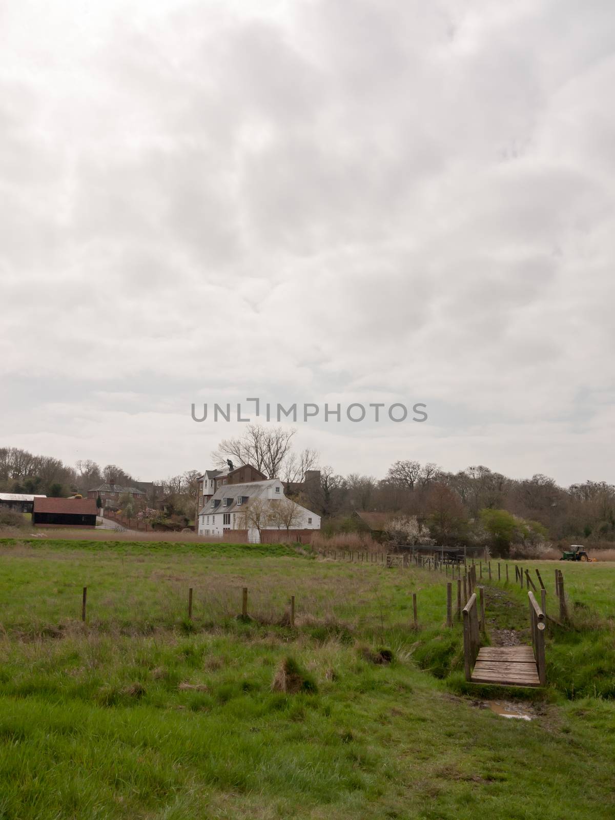 White farm house cottage mansion far off field trail bridge country environment nature by callumrc