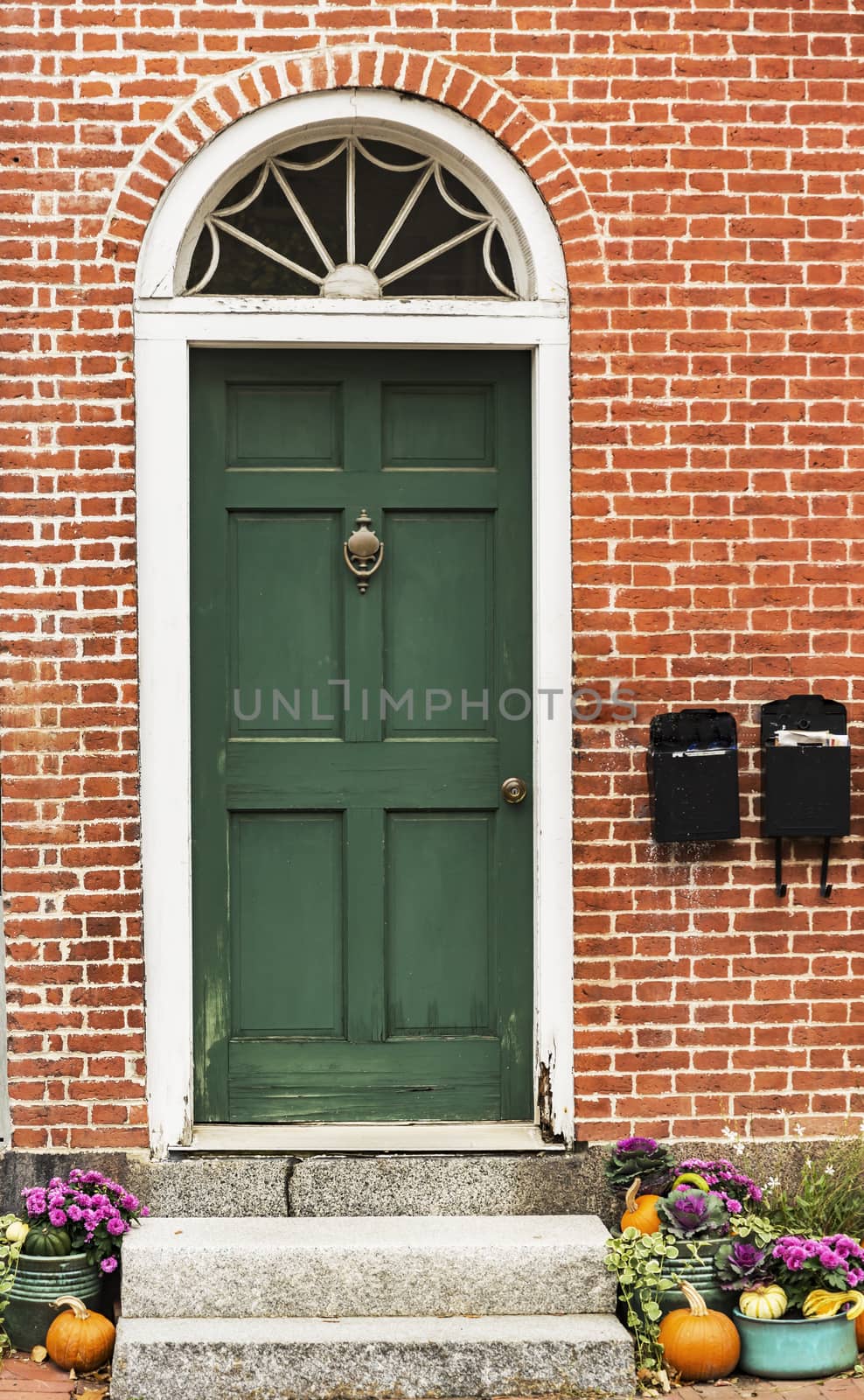 Door of a typical New England residential house with small entrance garden