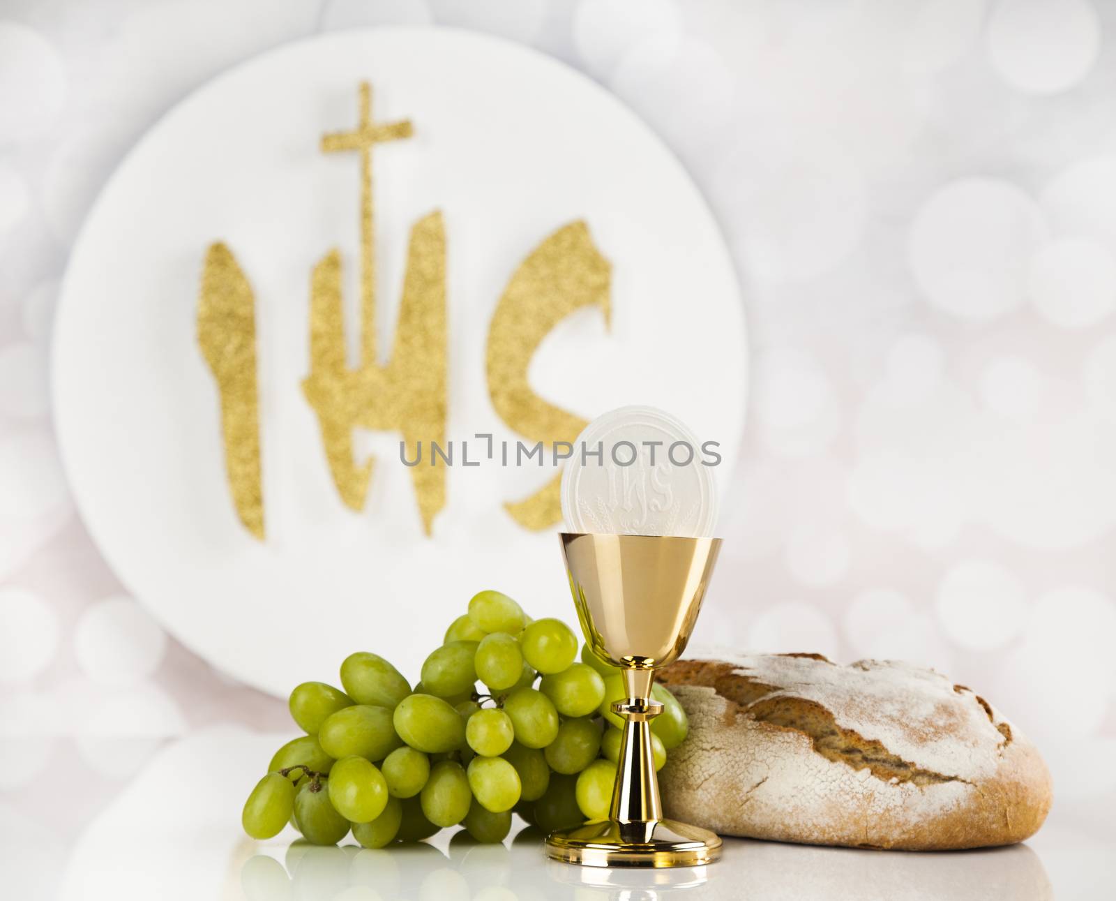 Holy communion a golden chalice, composition isolated on white by JanPietruszka