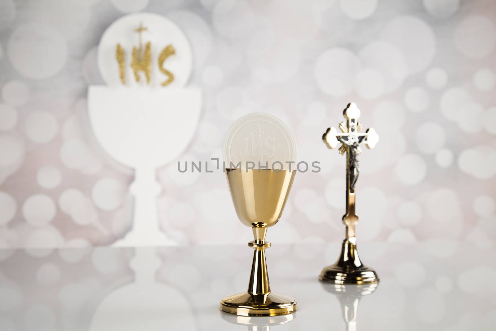 Holy communion a golden chalice, composition isolated on white by JanPietruszka