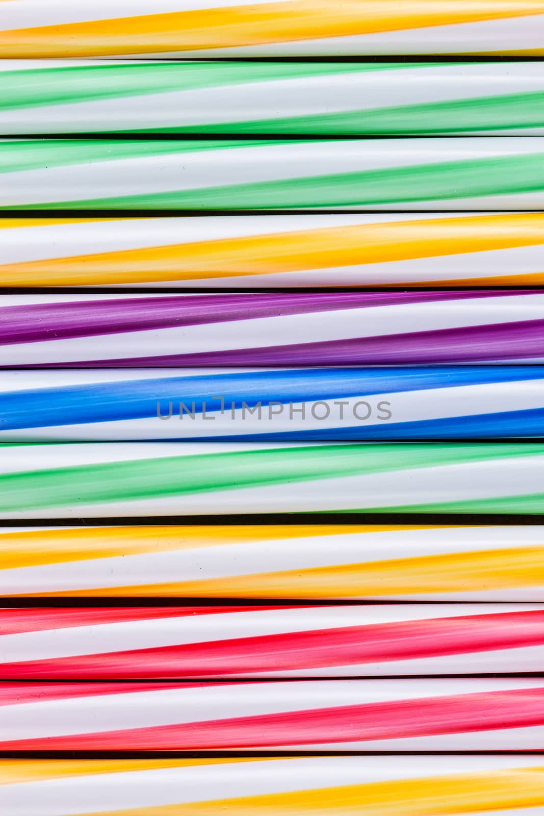Background stripes multicolored smoothies plastic cocktail straws