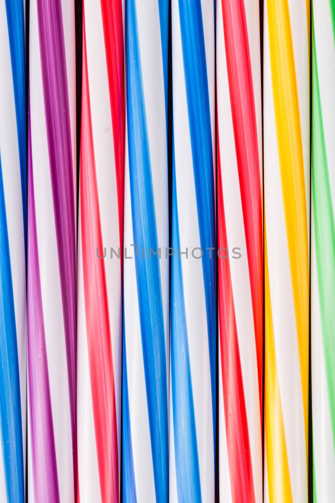 plastic cocktail straws background by victosha