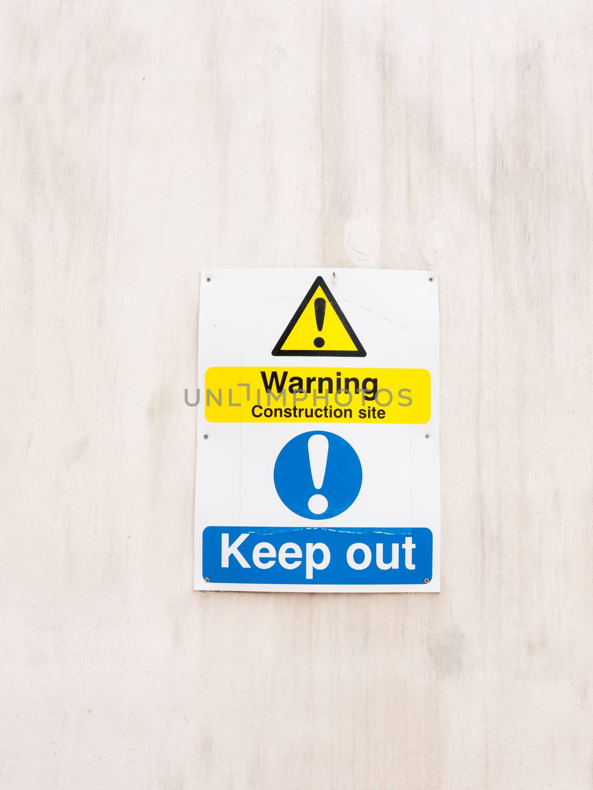 warning and keep out sign on white wall; Essex; UK